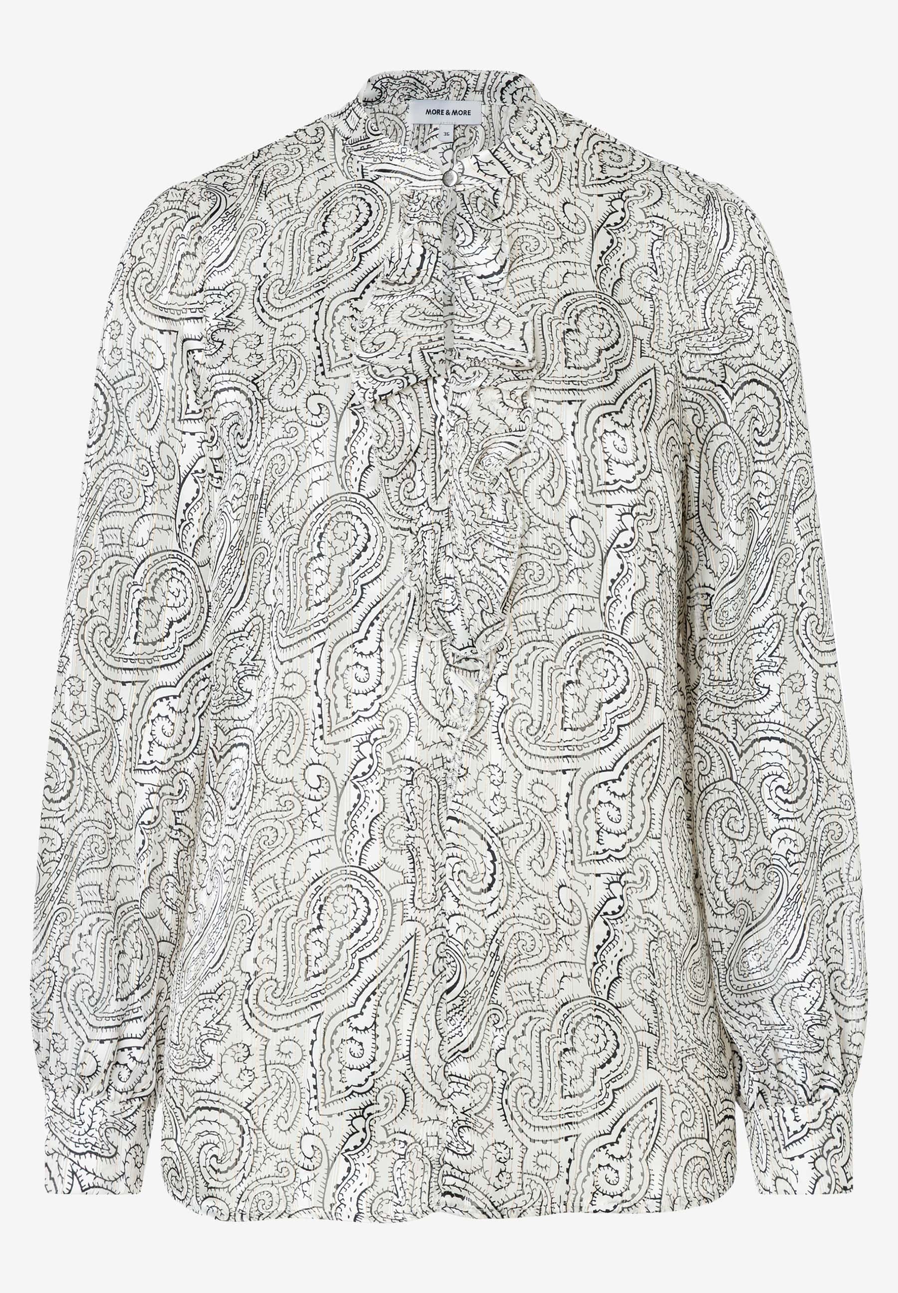 MORE & MORE Damenbluse in Schwarz-Weiß mit Paisley-Muster, Hemdkragen und Rüschendetail an der Knopfleiste. MORE & MORE Damenbluse in Schwarz-Weiß mit Paisley-Muster, Hemdkragen und Rüschendetail an der Knopfleiste.