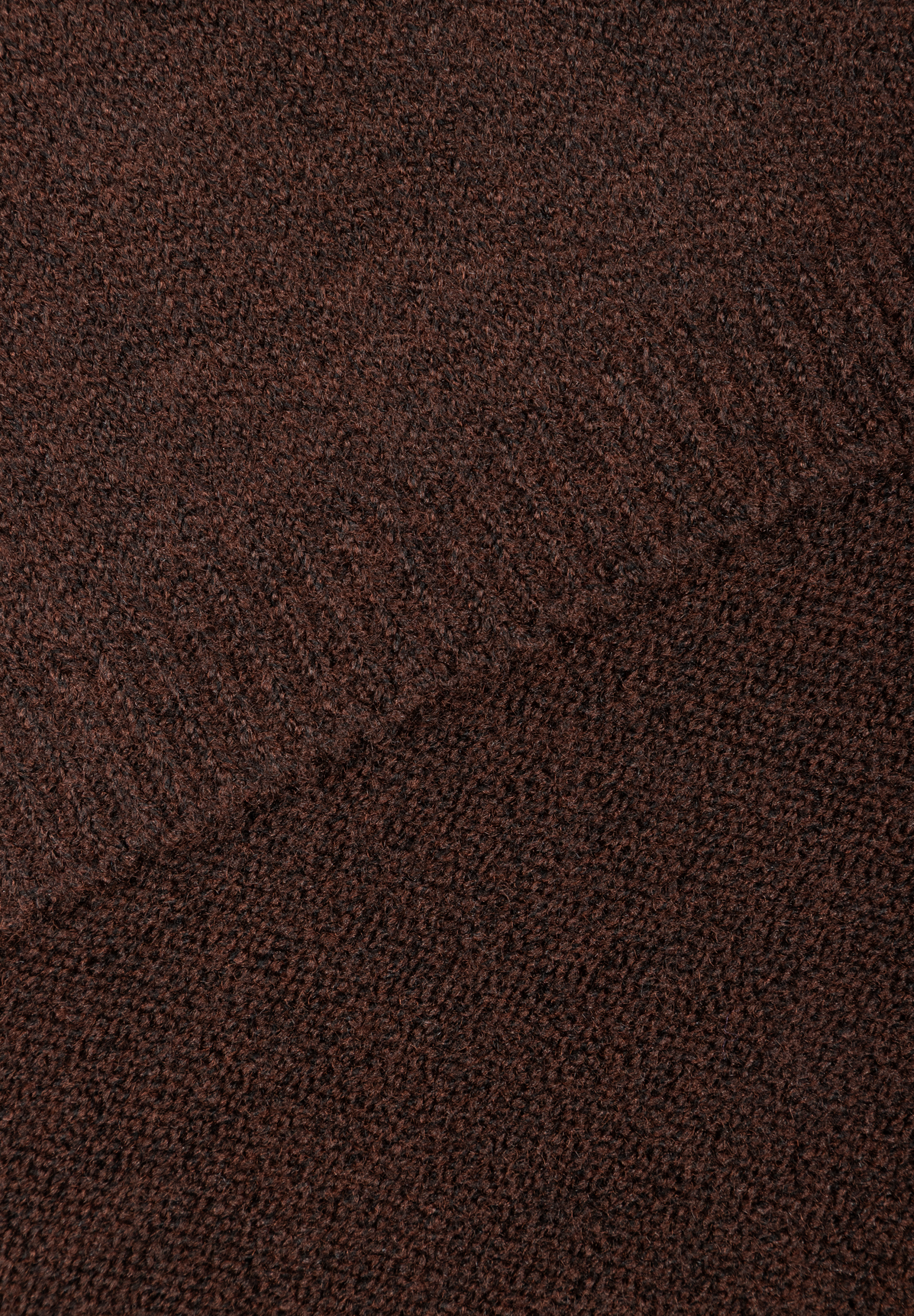 MORE & MORE Accessoire: Eine Nahaufnahme zeigt ein weiches, dunkelbraunes Textil mit feiner, ungleichmäßiger Struktur.