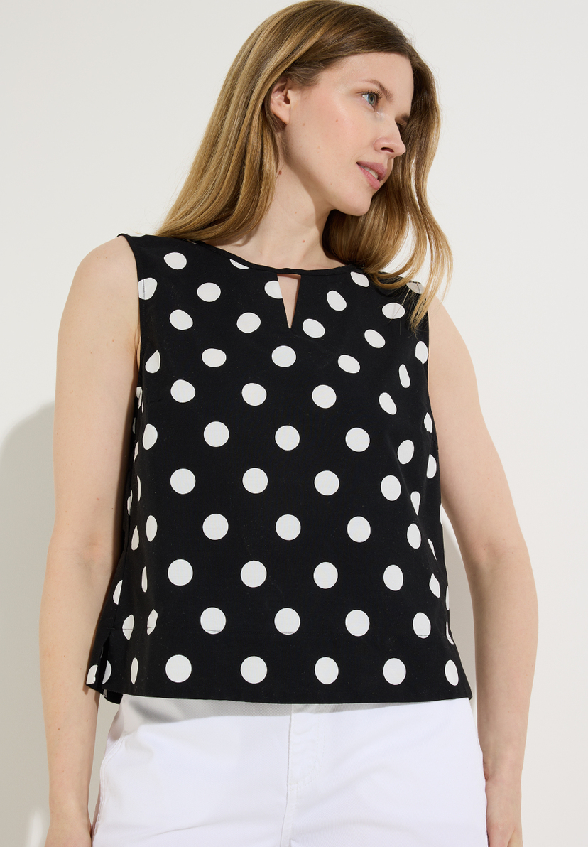 Ärmellose MORE & MORE Bluse mit weißem Punktmuster und Taillenband. Ärmellose MORE & MORE Bluse mit weißem Punktmuster und Taillenband.
