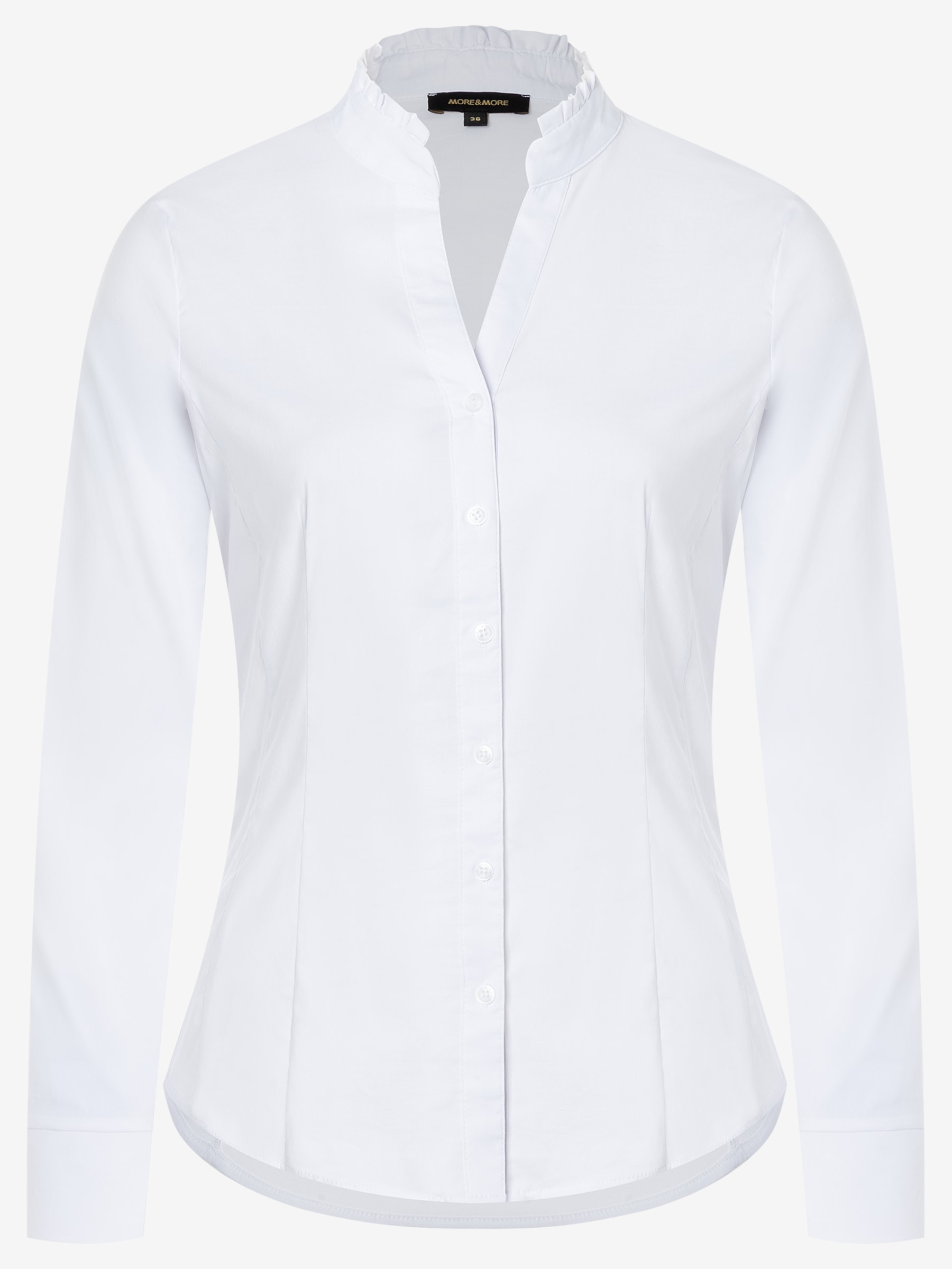Eine weiße, langärmlige Bluse mit Kräuselkragen der Marke MORE & MORE. Eine weiße, langärmlige Bluse mit Kräuselkragen der Marke MORE & MORE.