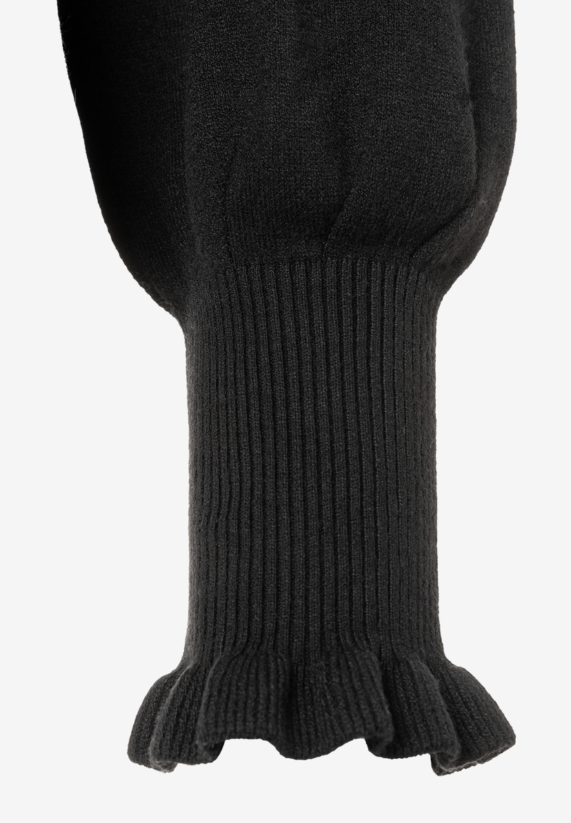 Detailaufnahme des Ärmels eines schwarzen MORE & MORE Feinstrick-Pullovers. Der Ärmel ist elastisch und hat einen angenehmen Tragekomfort. Detailaufnahme des Ärmels eines schwarzen MORE & MORE Feinstrick-Pullovers. Der Ärmel ist elastisch und hat einen angenehmen Tragekomfort.