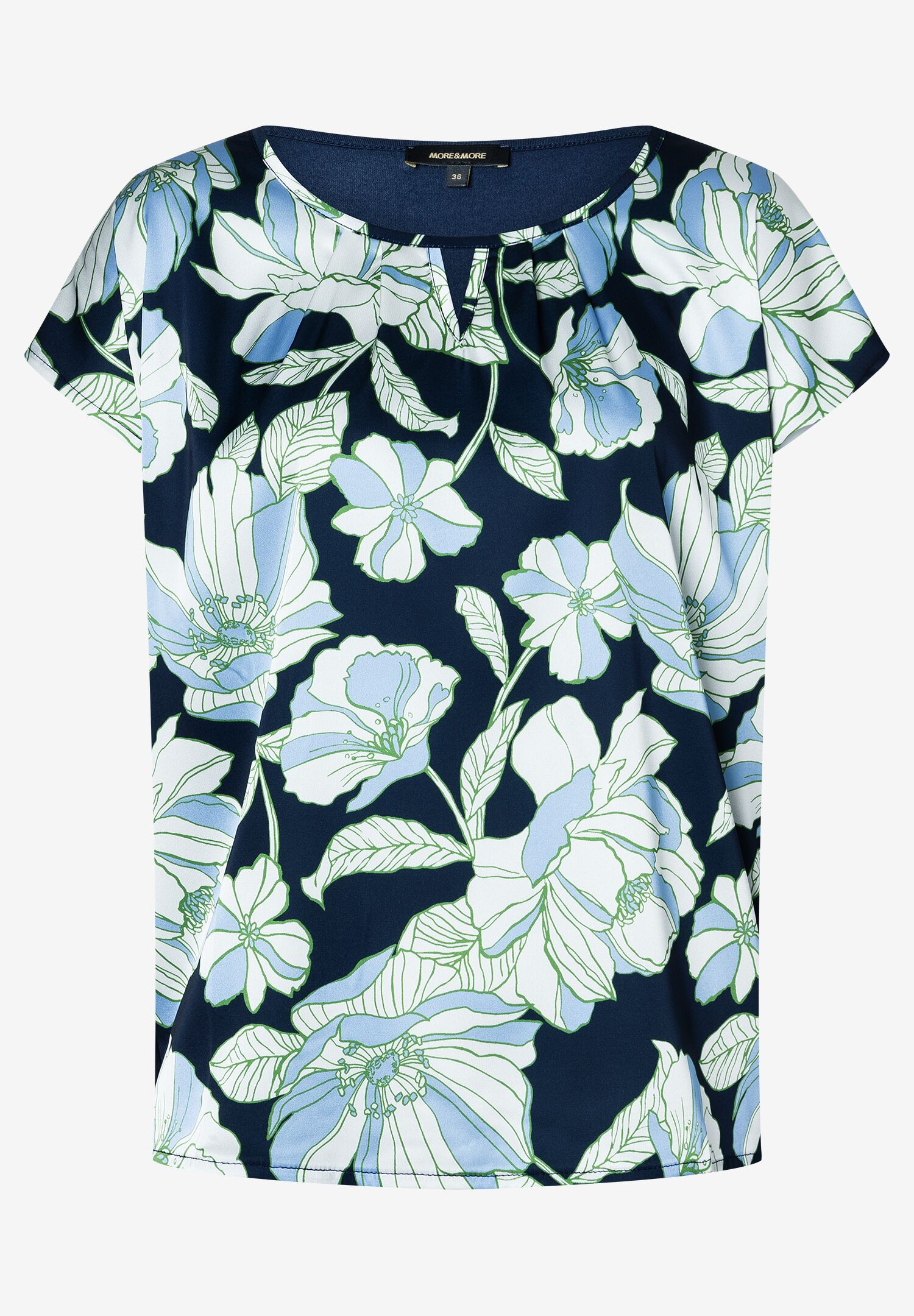 Ein MORE & MORE Top mit blau-weißem Blumenmuster. Ein MORE & MORE Top mit blau-weißem Blumenmuster.