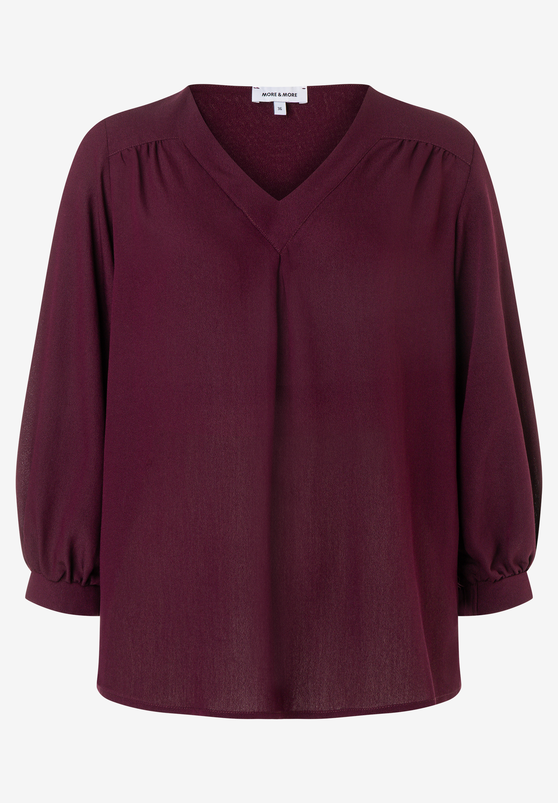 MORE & MORE Bluse: Bordeauxrotes Oberteil mit V-Ausschnitt, 3/4-Ärmeln und feinen Falten an den Schultern. MORE & MORE Bluse: Bordeauxrotes Oberteil mit V-Ausschnitt, 3/4-Ärmeln und feinen Falten an den Schultern.