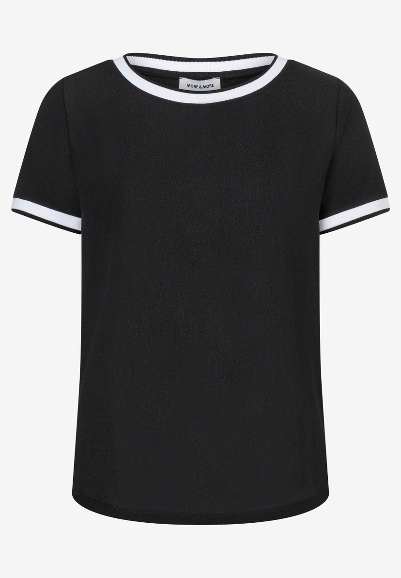Schwarzes MORE & MORE T-Shirt mit weißen Bündchen an Hals und Ärmeln. Schwarzes MORE & MORE T-Shirt mit weißen Bündchen an Hals und Ärmeln.
