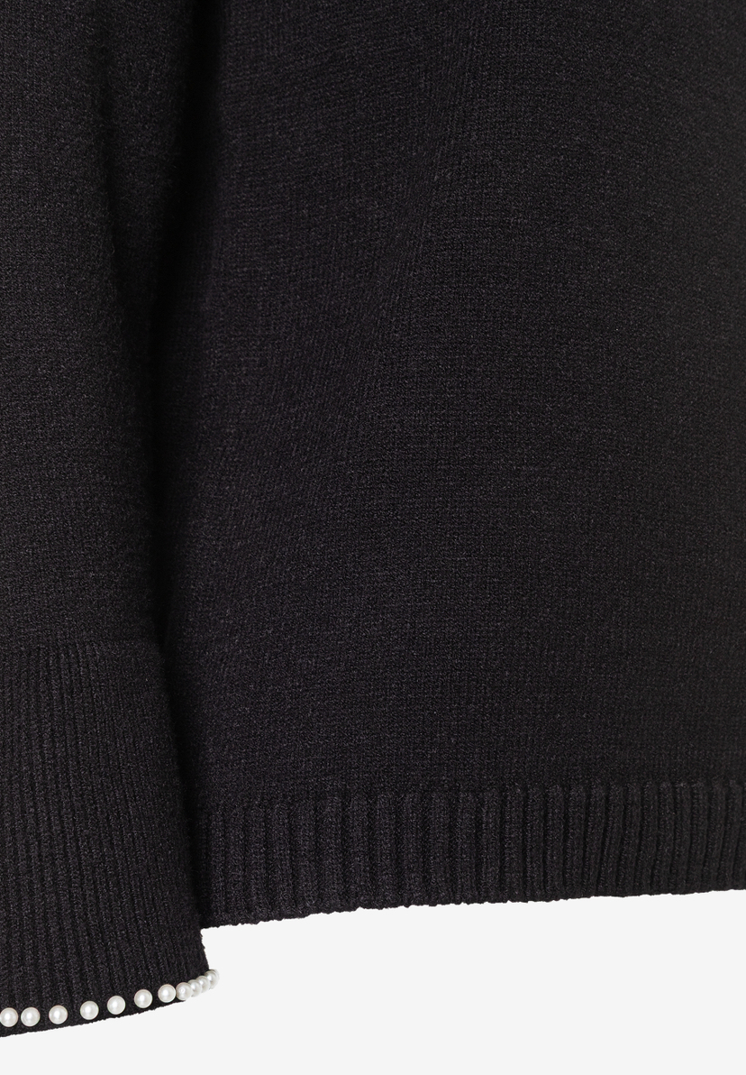 Detailaufnahme des MORE & MORE Strickpullovers mit Perlen am Ärmel. Bequemes, elastisches Material. Detailaufnahme des MORE & MORE Strickpullovers mit Perlen am Ärmel. Bequemes, elastisches Material.