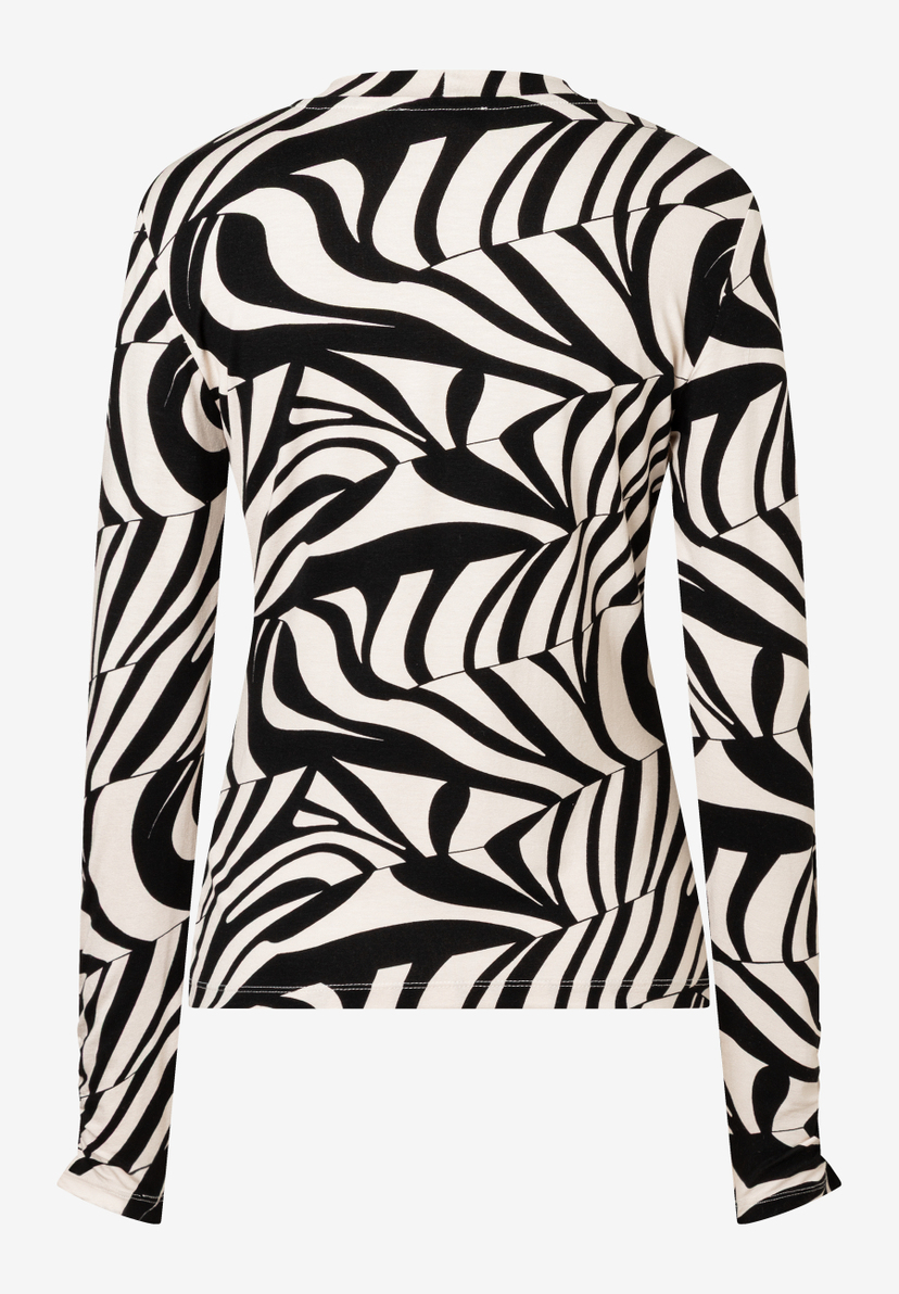 Ein MORE & MORE Oberteil mit grafischem Muster in Schwarz-Weiß. Ein MORE & MORE Oberteil mit grafischem Muster in Schwarz-Weiß.