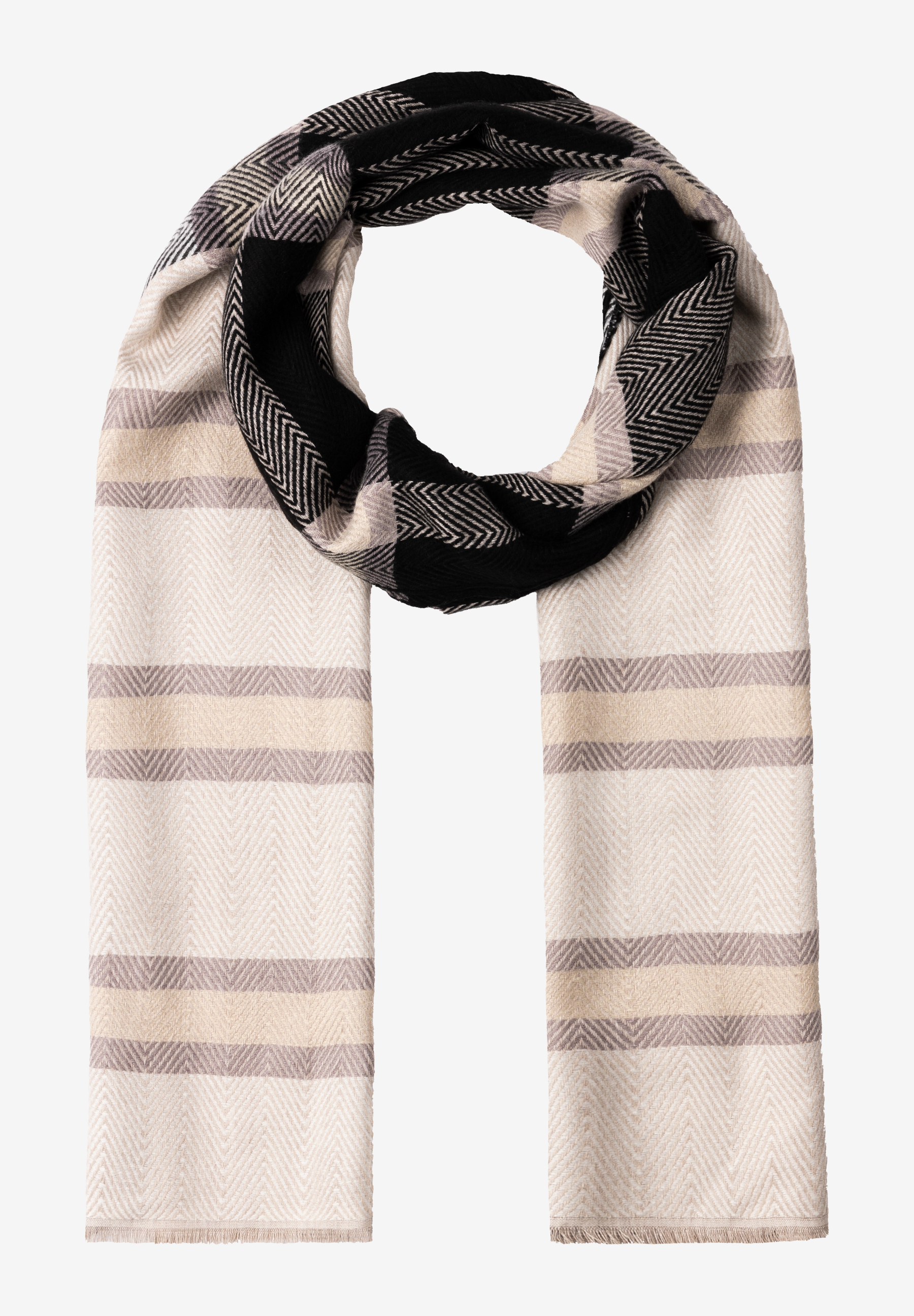 Ein MORE & MORE Accessoire: Ein beiger Schal mit breiten, hellbraunen Streifen und einem schwarz-weiß gemusterten Bereich liegt gewickelt. Ein MORE & MORE Accessoire: Ein beiger Schal mit breiten, hellbraunen Streifen und einem schwarz-weiß gemusterten Bereich liegt gewickelt.