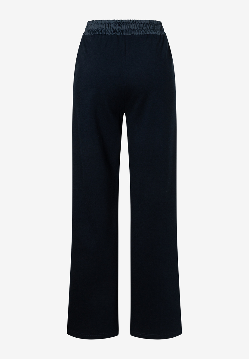 MORE & MORE schwarze Jeans mit weitem Bein und elastischem Bund. Der Stoff fällt locker bis zum Knöchel.