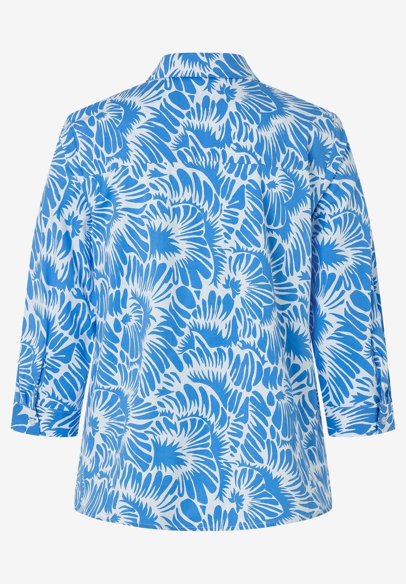 Die MORE & MORE Bluse mit blau-weißem Muster hat lange Ärmel und ist aus leichtem Stretch-Popeline gefertigt. Die MORE & MORE Bluse mit blau-weißem Muster hat lange Ärmel und ist aus leichtem Stretch-Popeline gefertigt.