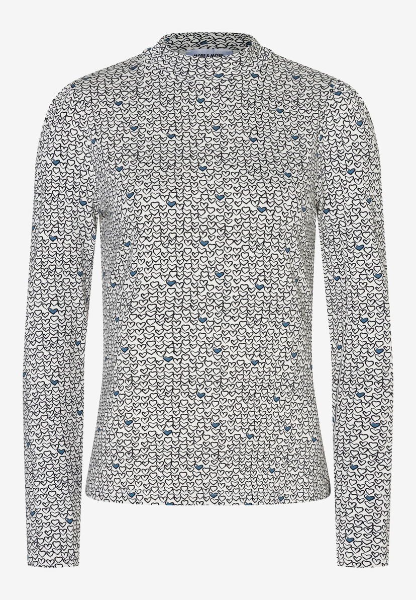 Ein MORE & MORE Oberteil, bedeckt mit schwarzen und blauen Herzen. Ein MORE & MORE Oberteil, bedeckt mit schwarzen und blauen Herzen.