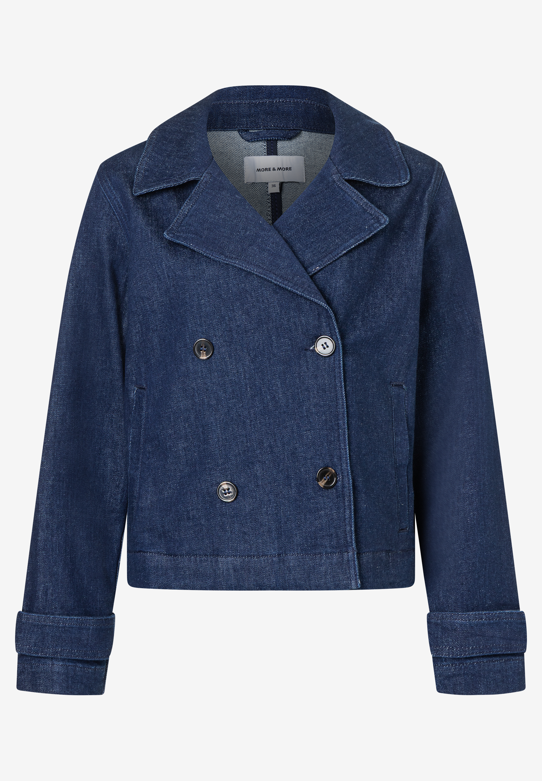 Eine dunkelblaue Jeansjacke von MORE & MORE, strapazierfähig und mit auffälligen Knöpfen. Eine dunkelblaue Jeansjacke von MORE & MORE, strapazierfähig und mit auffälligen Knöpfen.