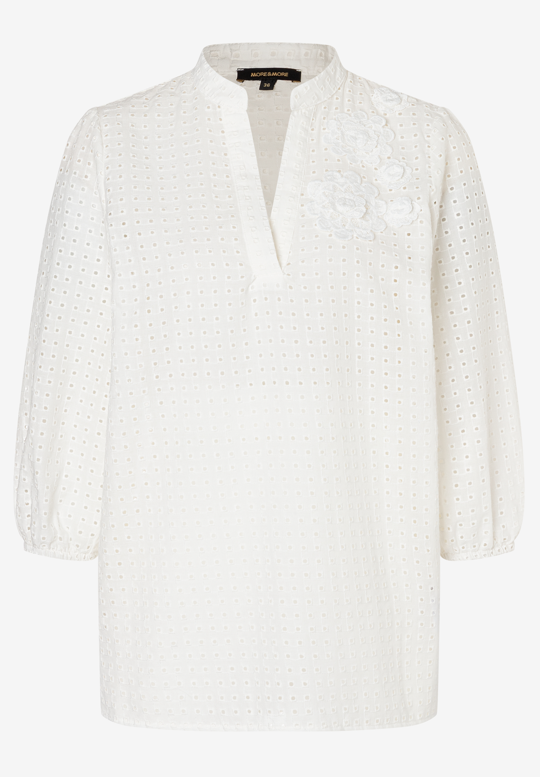 Weiße MORE & MORE Bluse mit Spitzenstruktur und V-Ausschnitt. Weiße MORE & MORE Bluse mit Spitzenstruktur und V-Ausschnitt.