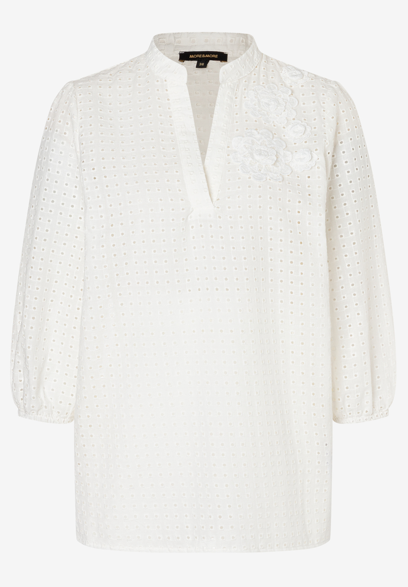 Weiße MORE & MORE Bluse mit Spitzenstruktur und V-Ausschnitt. Weiße MORE & MORE Bluse mit Spitzenstruktur und V-Ausschnitt.