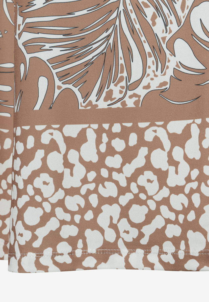 Nahaufnahme der MORE & MORE Hose/Jeans mit Jersey-Material und Blätter-/Leopardenmuster. Nahaufnahme der MORE & MORE Hose/Jeans mit Jersey-Material und Blätter-/Leopardenmuster.