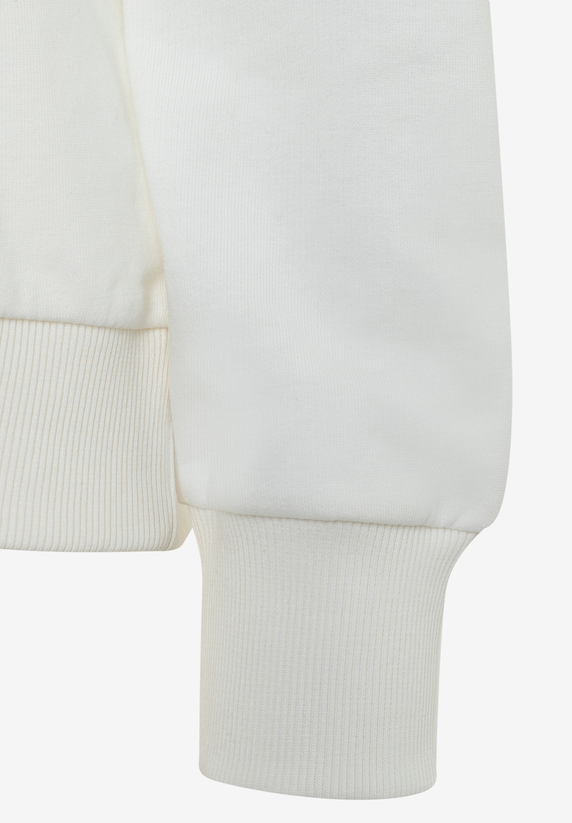 Detailansicht Ärmel eines MORE & MORE Sweatshirts in Weiß. Angenehmer Tragekomfort und elastisch. Detailansicht Ärmel eines MORE & MORE Sweatshirts in Weiß. Angenehmer Tragekomfort und elastisch.