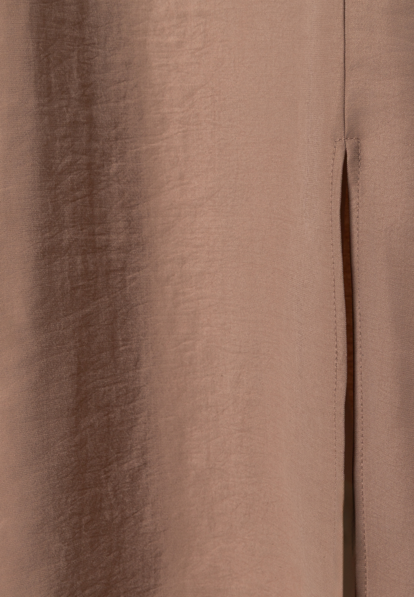 Detailansicht eines Rockes von MORE & MORE, der fließend und angenehm zu tragen ist.