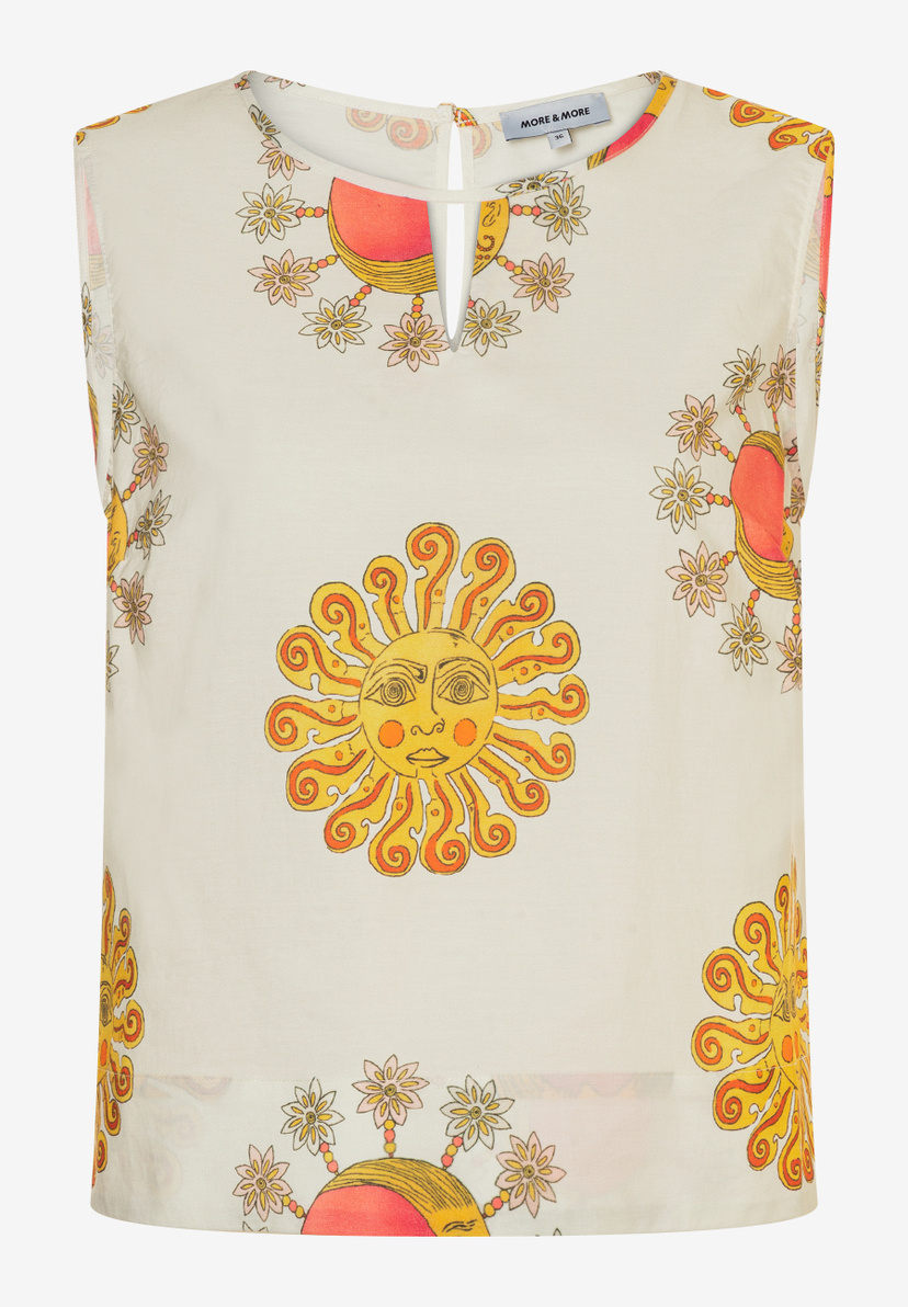 Ärmellose Bluse von MORE & MORE mit großem Sonnen- und Blumenmuster. Ärmellose Bluse von MORE & MORE mit großem Sonnen- und Blumenmuster.