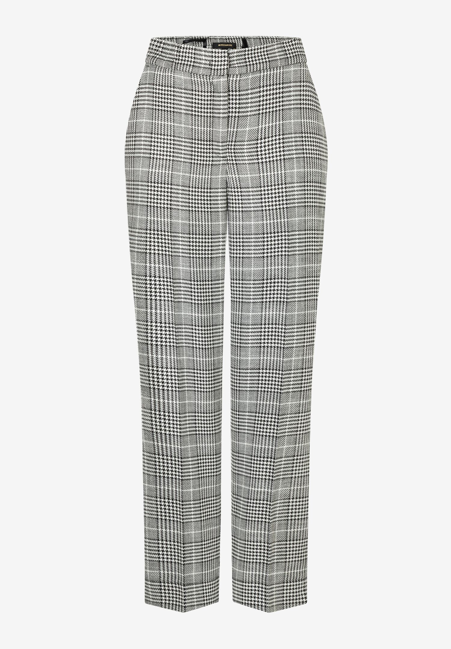 Eine MORE & MORE Hose mit Karomuster in Schwarz und Weiß. Eine MORE & MORE Hose mit Karomuster in Schwarz und Weiß.
