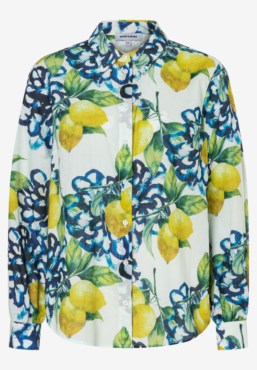 Eine MORE & MORE Bluse mit Zitronen- und Blumenmuster. Eine MORE & MORE Bluse mit Zitronen- und Blumenmuster.