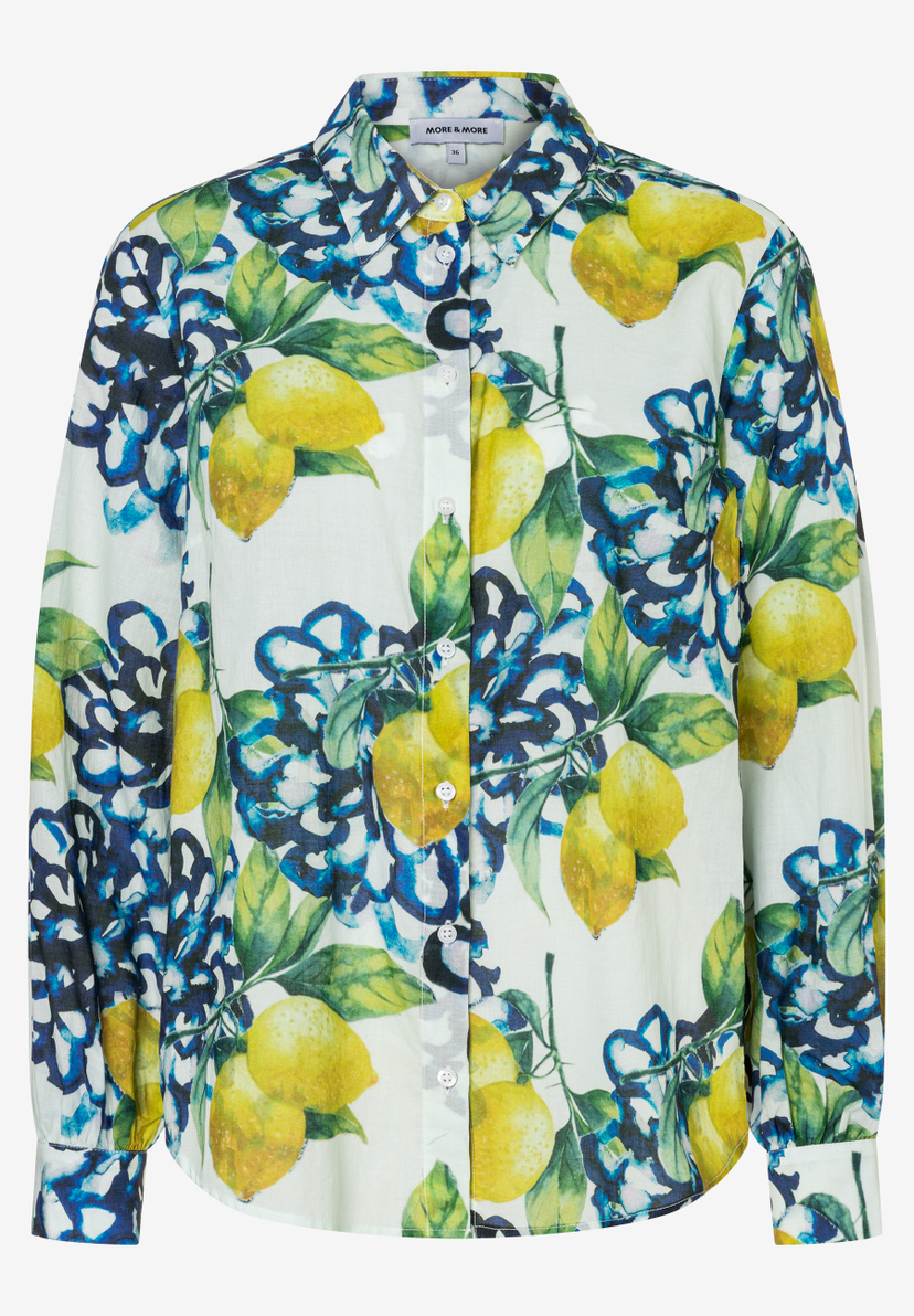 Eine MORE & MORE Bluse mit Zitronen- und Blumenmuster. Eine MORE & MORE Bluse mit Zitronen- und Blumenmuster.