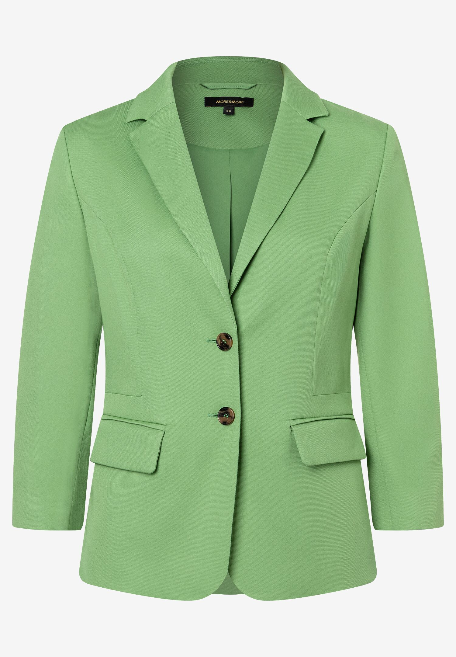 Ein grüner MORE & MORE Blazer mit zwei Knöpfen und Taschen. Ein grüner MORE & MORE Blazer mit zwei Knöpfen und Taschen.