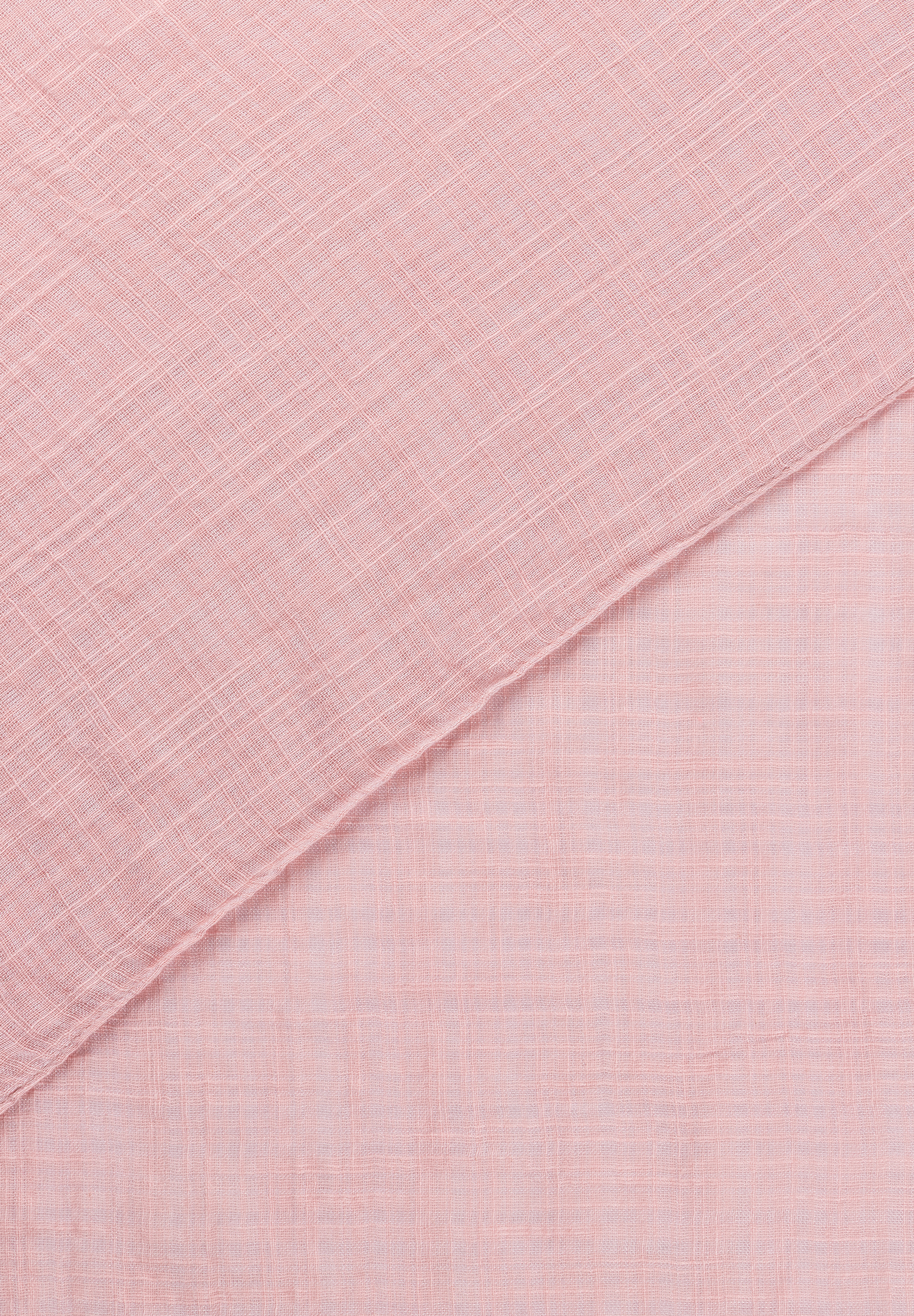 Nahaufnahme des MORE & MORE Accessoires mit feiner, rosa Textur. Nahaufnahme des MORE & MORE Accessoires mit feiner, rosa Textur.
