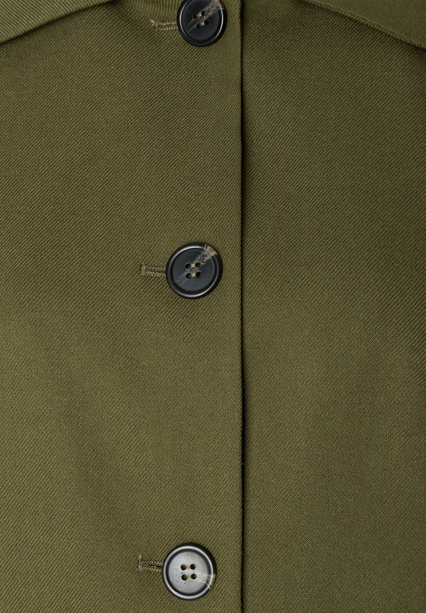 MORE & MORE Blazer in Olivgrün mit glänzenden Knopfdetails. MORE & MORE Blazer in Olivgrün mit glänzenden Knopfdetails.