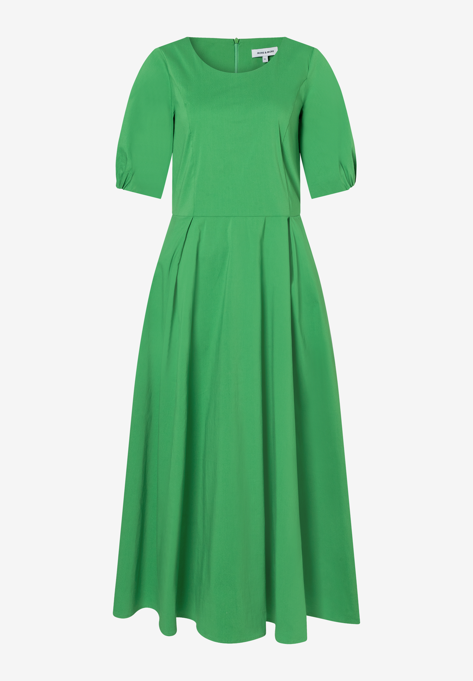 Ein grünes MORE & MORE Popeline Oberteil bzw. Kleid mit kurzen Ärmeln und einem ausgestellten Rockteil. Ein grünes MORE & MORE Popeline Oberteil bzw. Kleid mit kurzen Ärmeln und einem ausgestellten Rockteil.