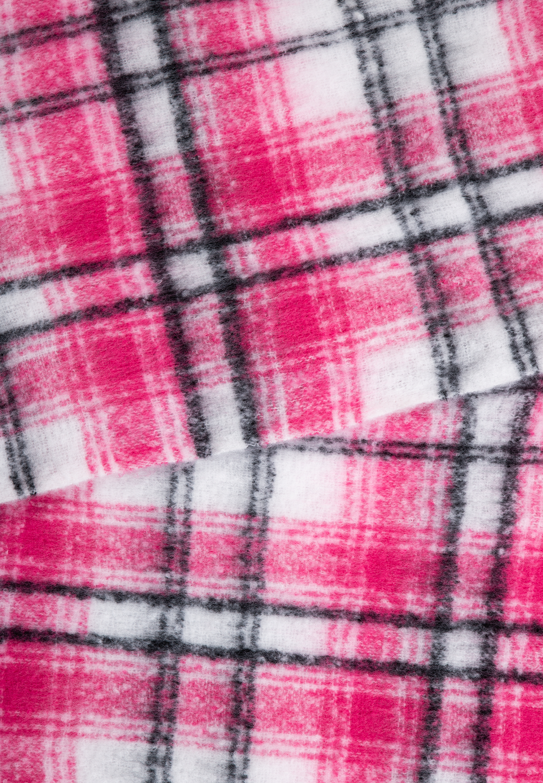 Detailaufnahme eines karierten Accessoires von MORE & MORE in Pink und Weiß. Detailaufnahme eines karierten Accessoires von MORE & MORE in Pink und Weiß.