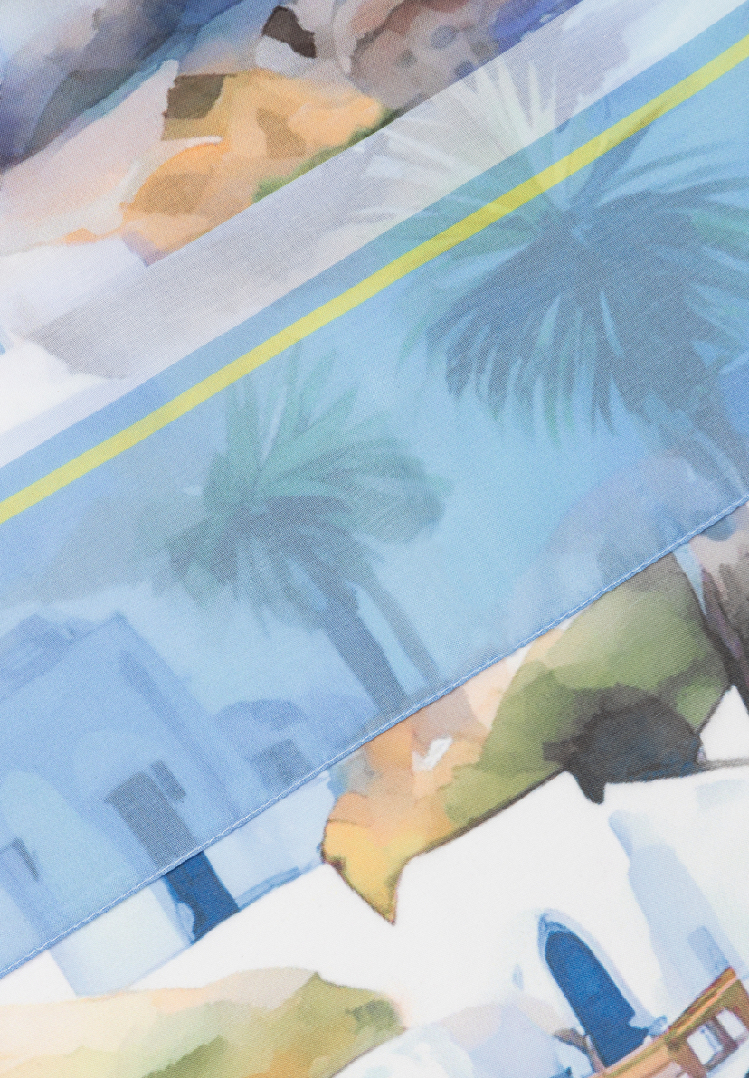 Detailaufnahme eines MORE & MORE Accessoires mit Strandmotiv in Blau-, Gelb- und Grüntönen.