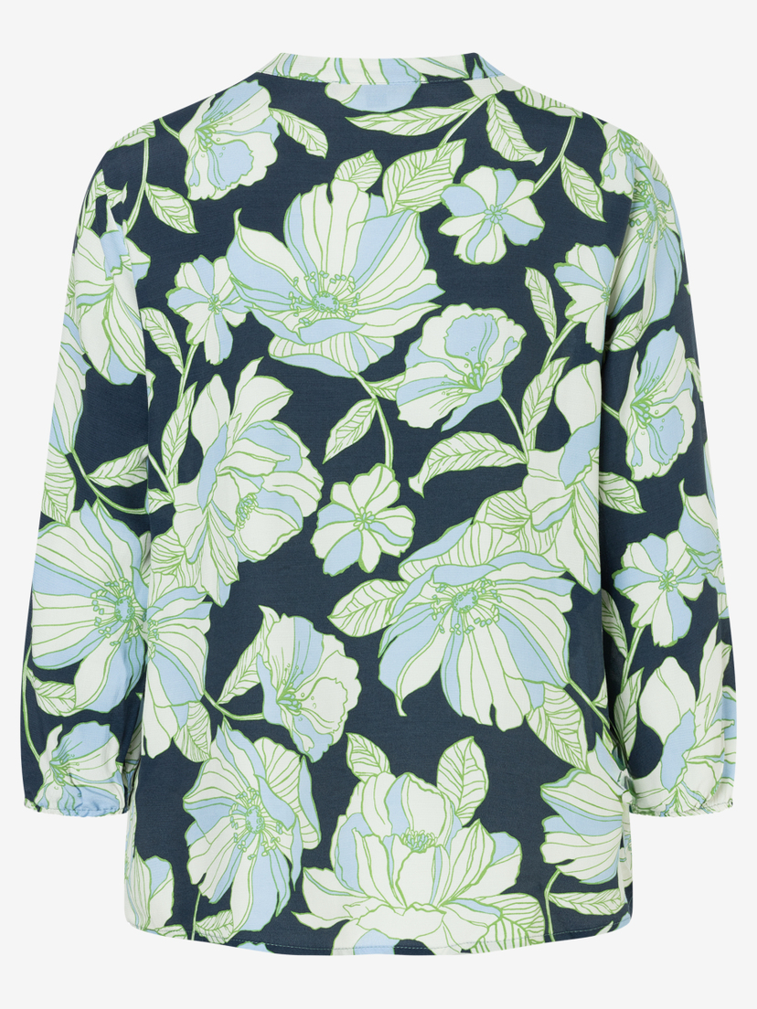 Eine MORE & MORE Bluse mit floralem Muster in Blau, Weiß und Grün. Eine MORE & MORE Bluse mit floralem Muster in Blau, Weiß und Grün.