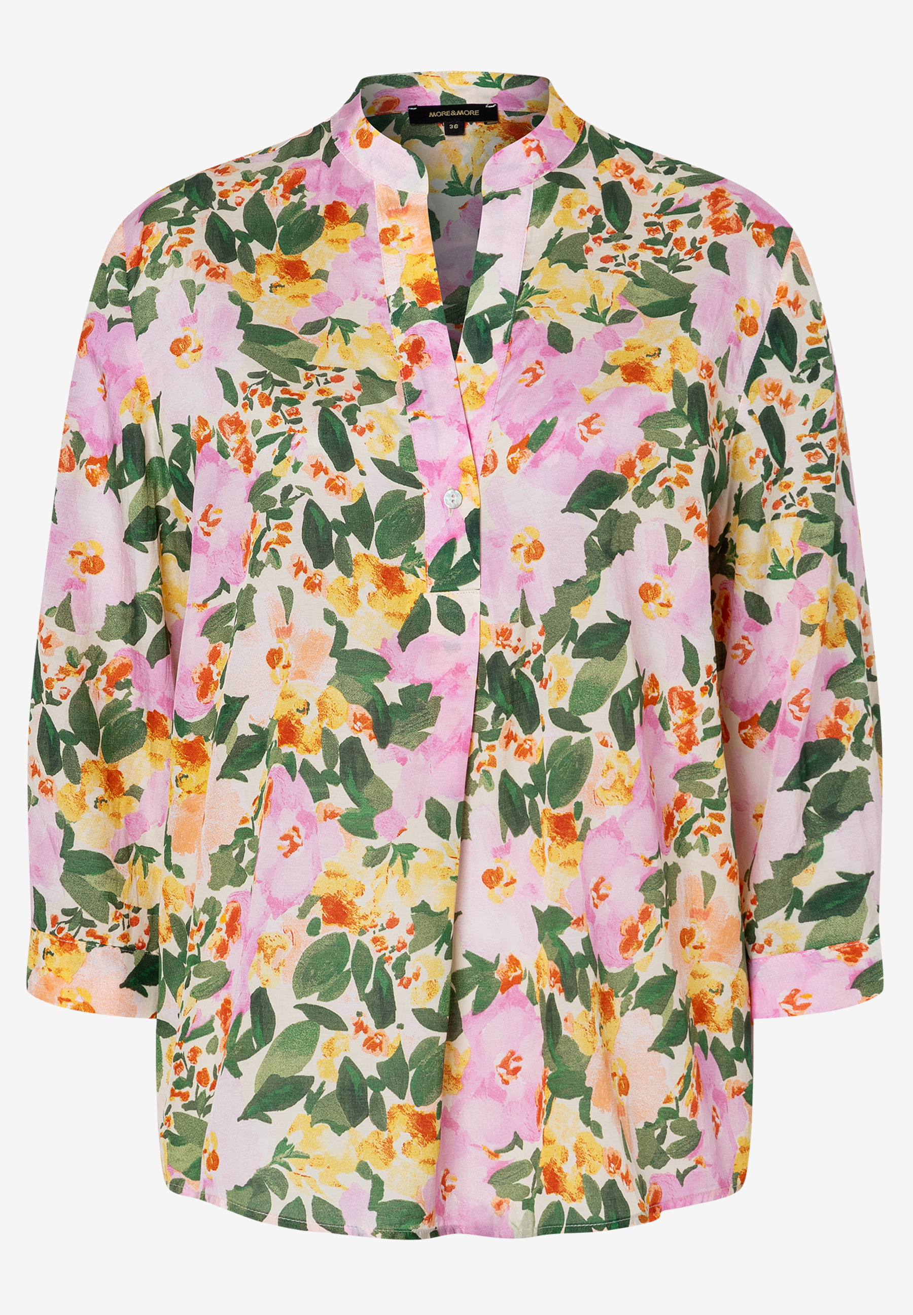 Eine MORE & MORE Bluse mit floralem Muster in Rosa-, Gelb- und Grüntönen. Die Bluse ist aus Viskosemischung und hat Dreiviertelärmel. Eine MORE & MORE Bluse mit floralem Muster in Rosa-, Gelb- und Grüntönen. Die Bluse ist aus Viskosemischung und hat Dreiviertelärmel.
