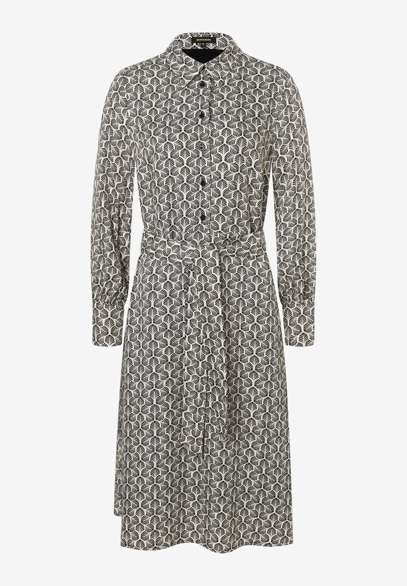 Ein MORE & MORE Oberteil mit Muster und langen Ärmeln. Ein MORE & MORE Oberteil mit Muster und langen Ärmeln.