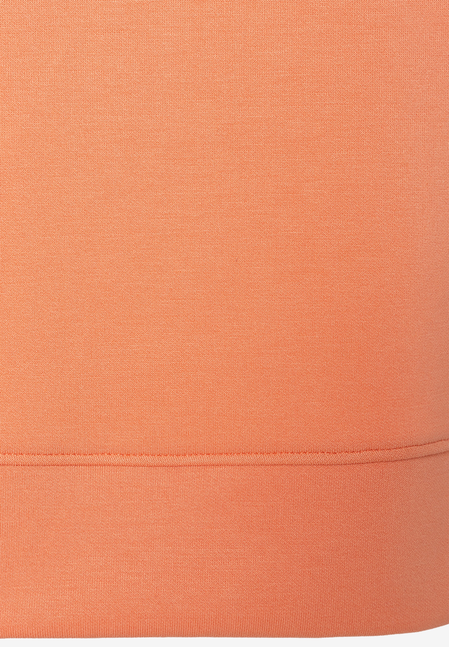 Nahaufnahme von MORE & MORE Sweatshirtstoff in Orange. Angenehmer Tragekomfort durch elastische Materialkonstruktion. Nahaufnahme von MORE & MORE Sweatshirtstoff in Orange. Angenehmer Tragekomfort durch elastische Materialkonstruktion.