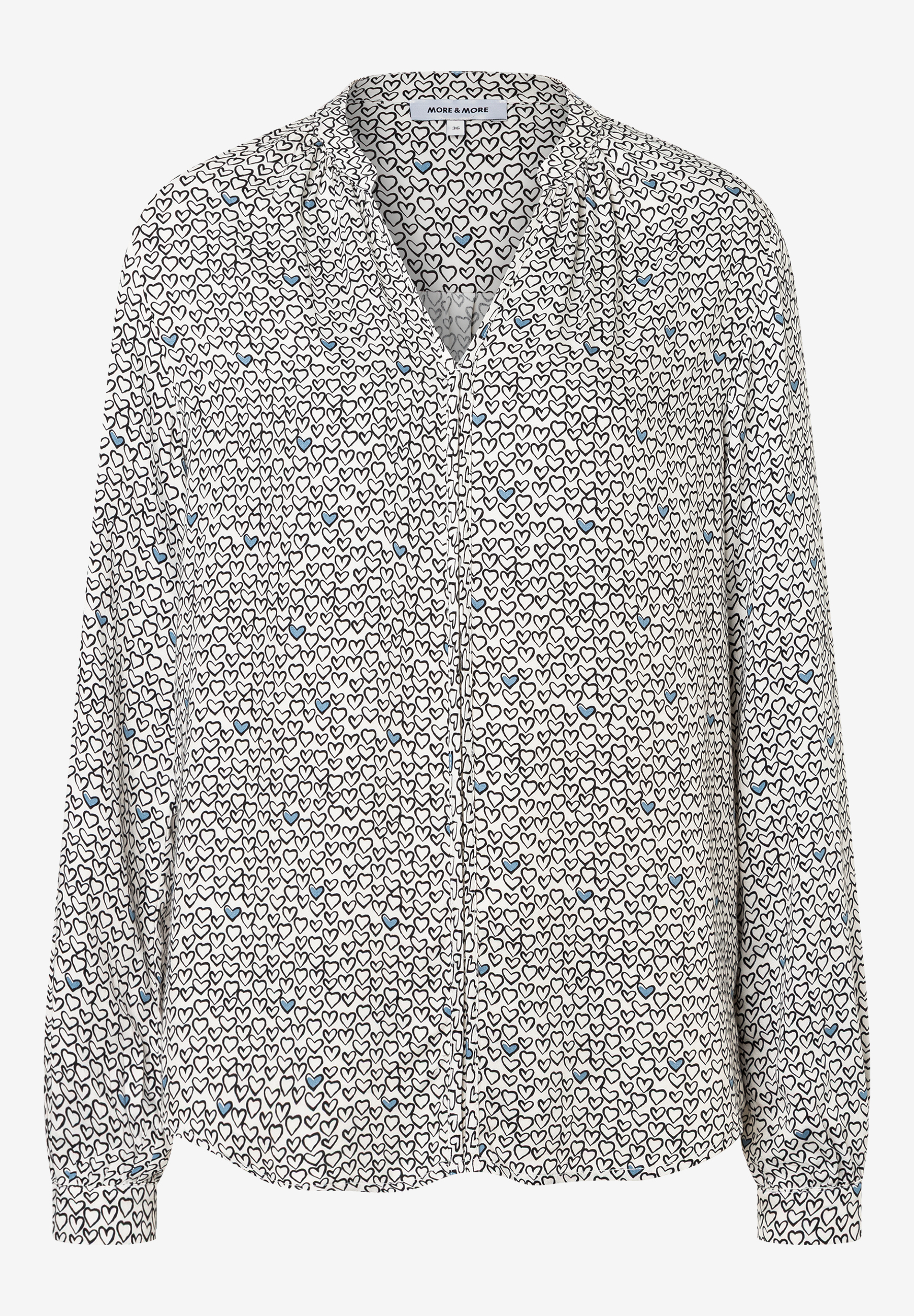 Eine MORE & MORE Bluse mit Herzmuster, lange Ärmel. Eine MORE & MORE Bluse mit Herzmuster, lange Ärmel.
