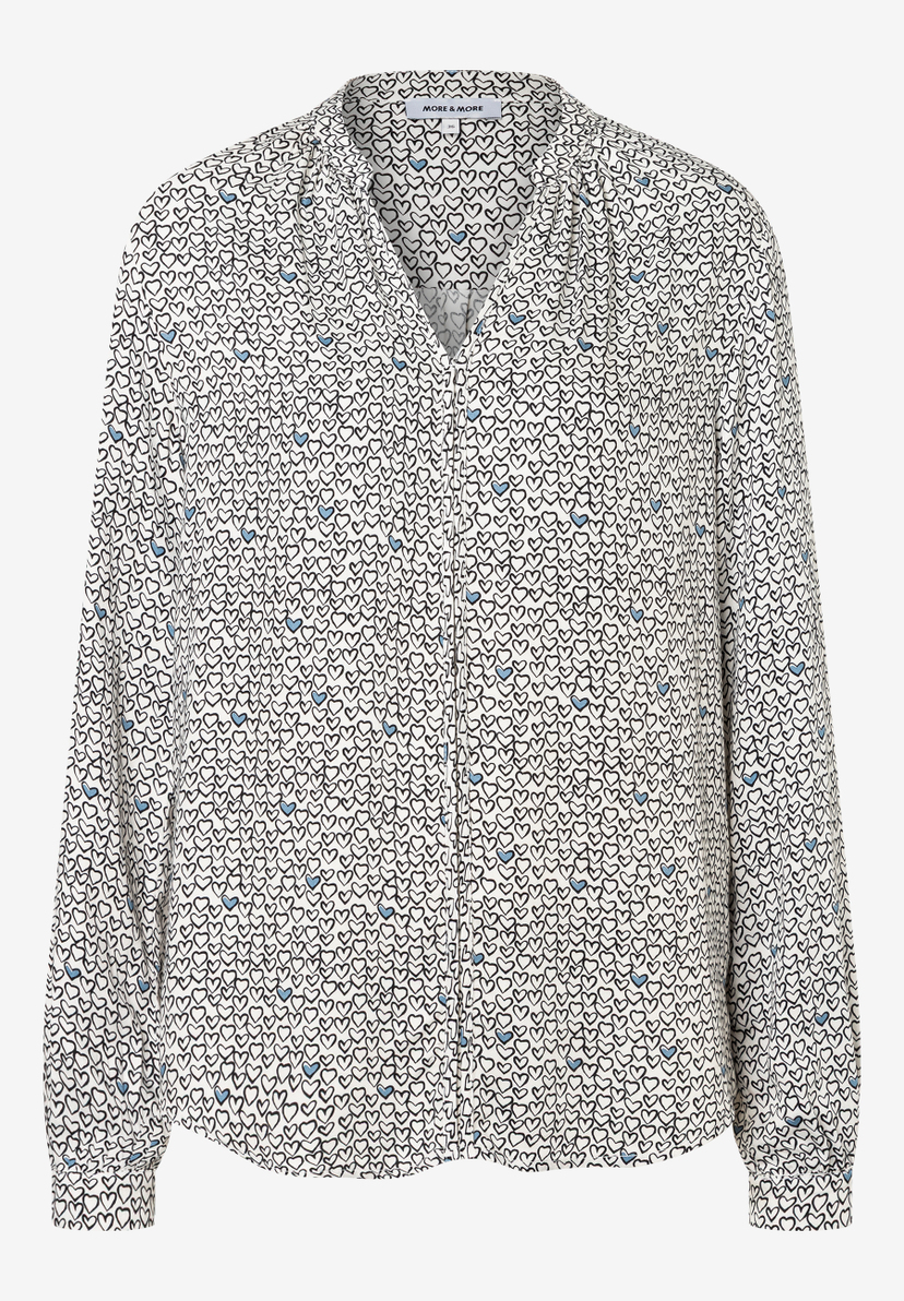 Eine MORE & MORE Bluse mit Herzmuster, lange Ärmel. Eine MORE & MORE Bluse mit Herzmuster, lange Ärmel.