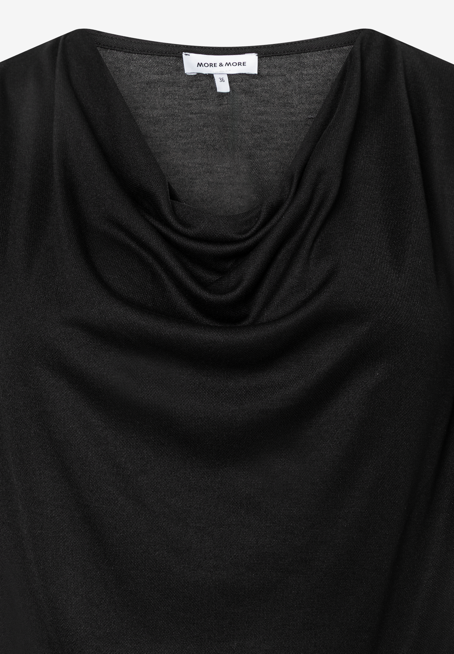 Schwarzes MORE & MORE Oberteil mit Wasserfallausschnitt aus Jersey. Schwarzes MORE & MORE Oberteil mit Wasserfallausschnitt aus Jersey.