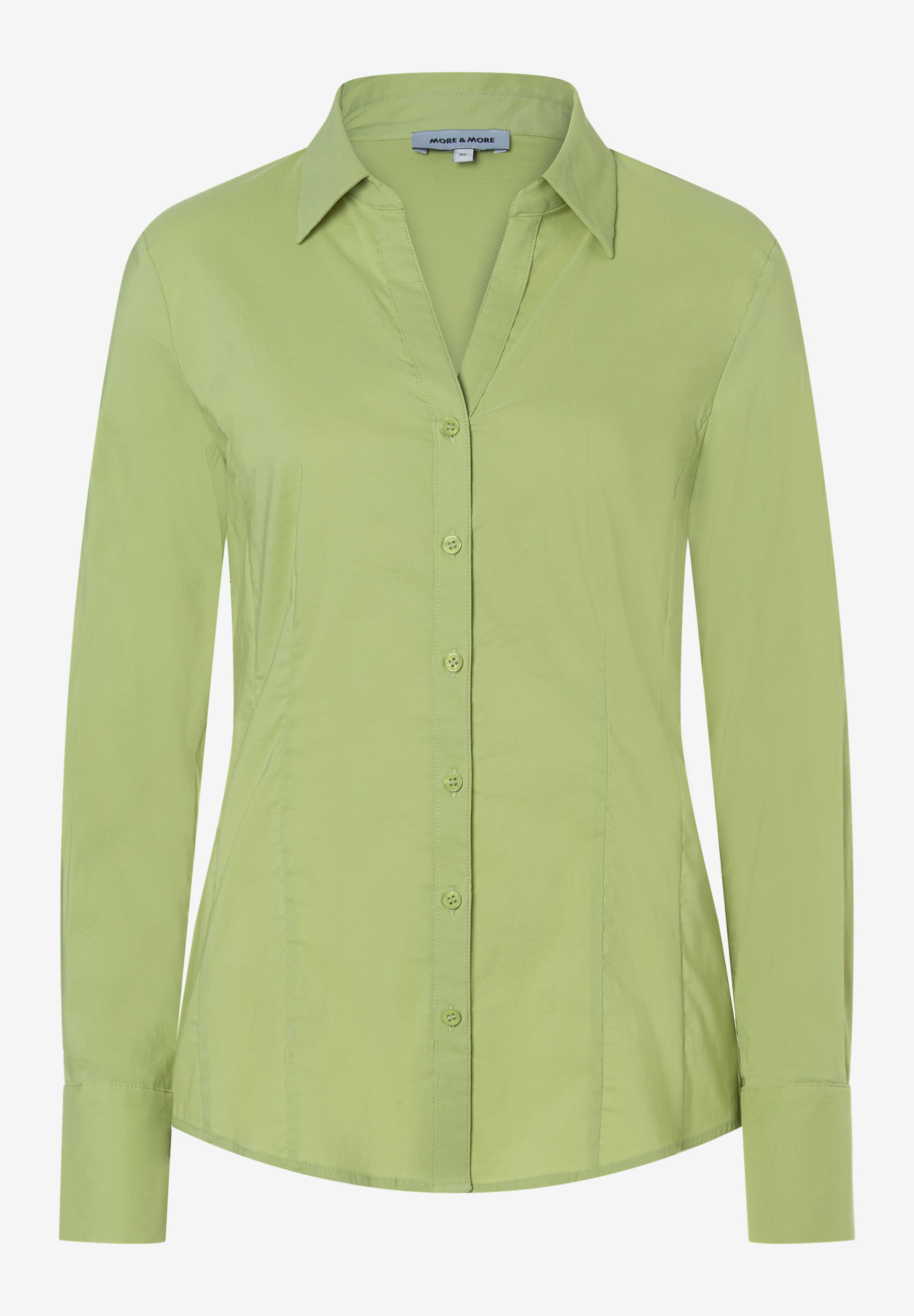 Eine hellgrüne, langärmlige Bluse von MORE & MORE mit Knopfleiste und Kragen. Eine hellgrüne, langärmlige Bluse von MORE & MORE mit Knopfleiste und Kragen.
