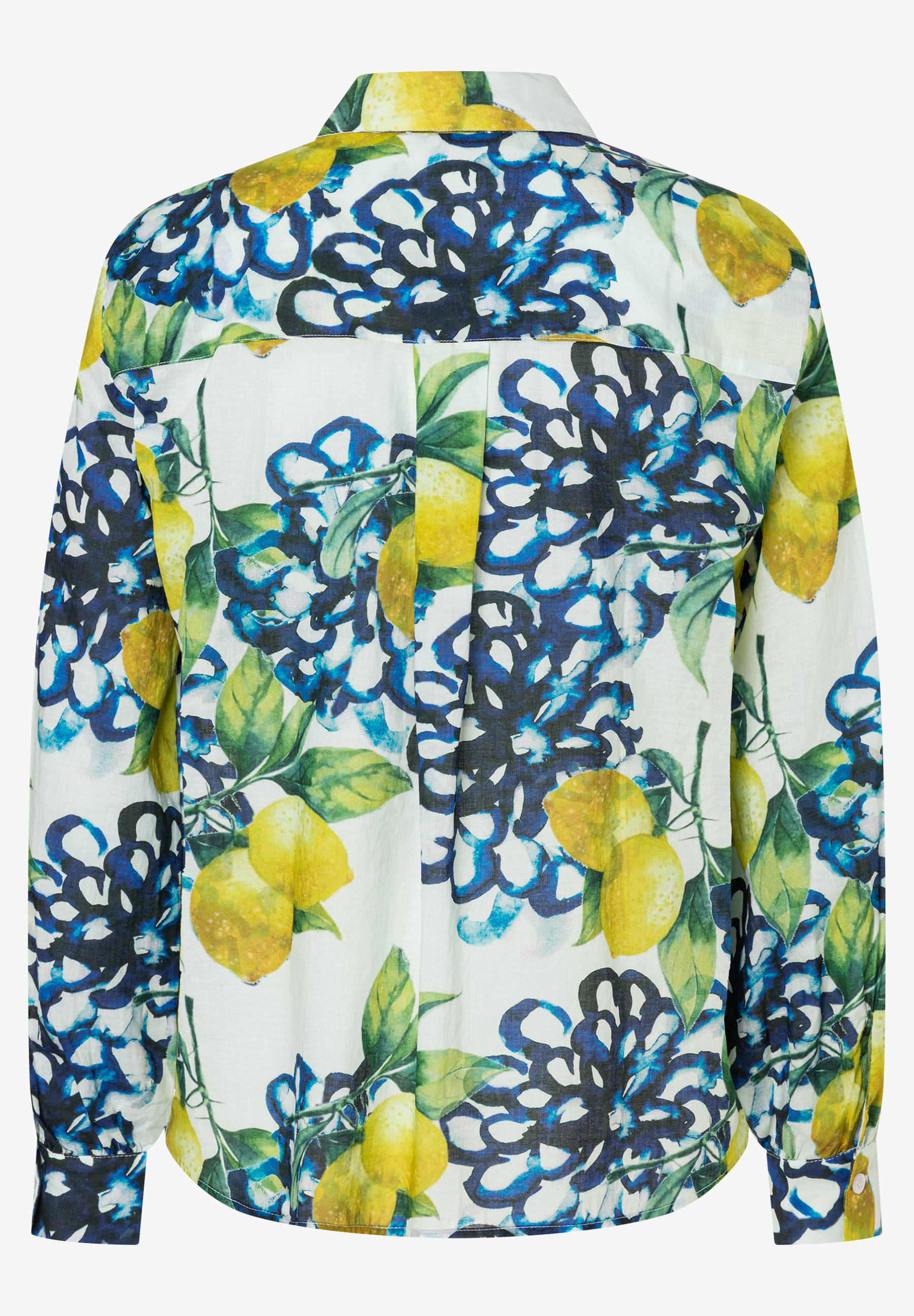 Eine MORE & MORE Bluse mit Zitrone- und Blumenmuster. Eine MORE & MORE Bluse mit Zitrone- und Blumenmuster.
