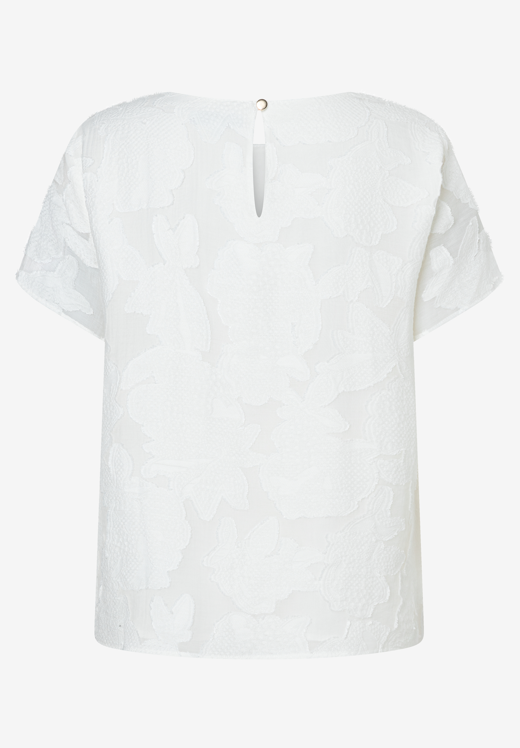 Eine weiße MORE & MORE Bluse mit Blumenmuster, kurze Ärmel und Knopfverschluss im Nacken. Eine weiße MORE & MORE Bluse mit Blumenmuster, kurze Ärmel und Knopfverschluss im Nacken.