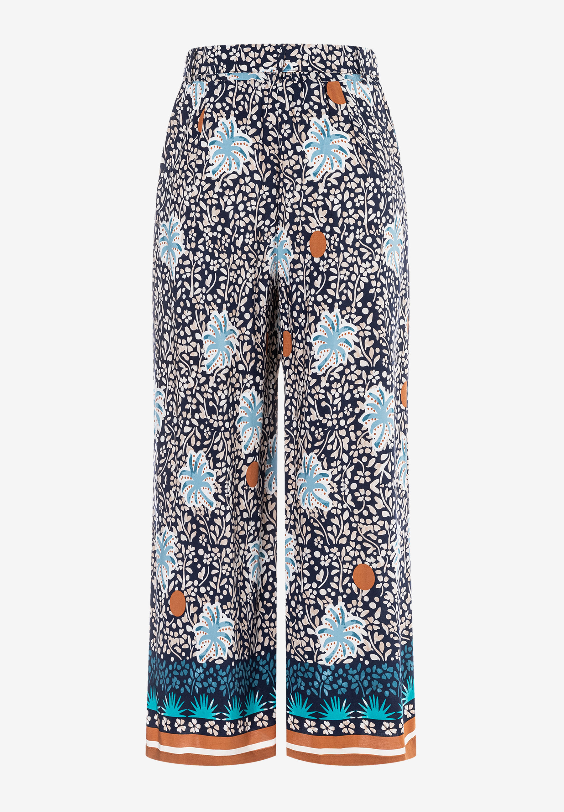 Eine bedruckte, blaue MORE & MORE Hose mit Blumenmuster. Eine bedruckte, blaue MORE & MORE Hose mit Blumenmuster.