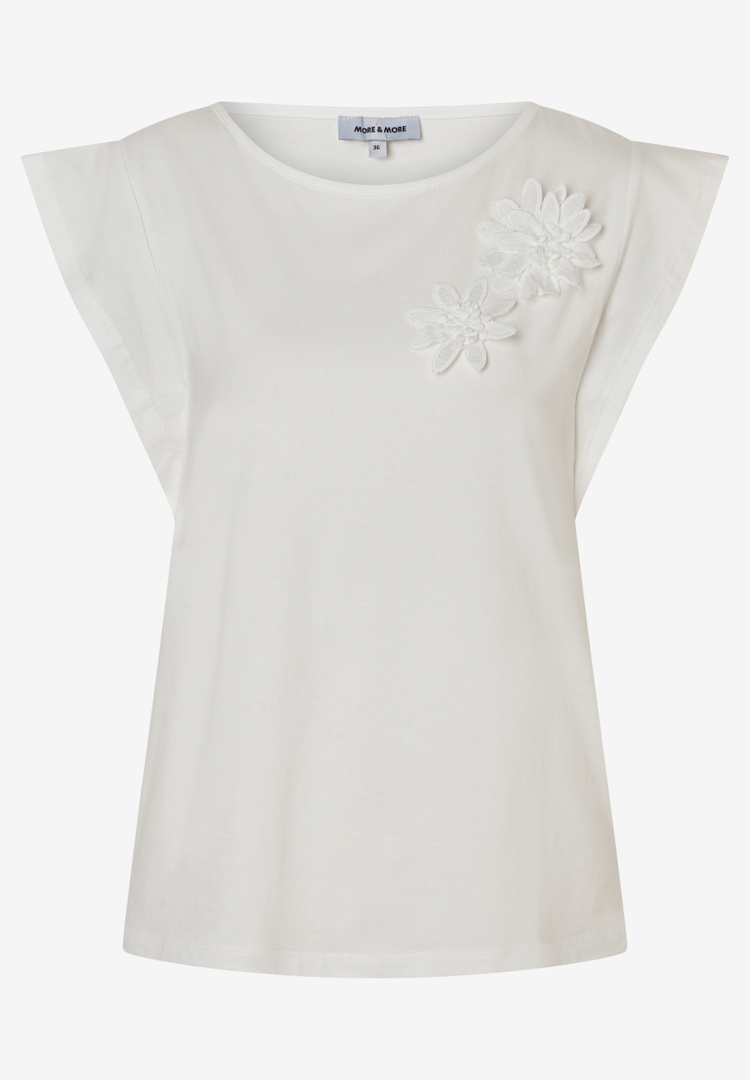 MORE & MORE weißes T-Shirt aus elastischem Jersey mit 3D-Blumenapplikationen auf der linken Brust, kurzer Raglanärmel MORE & MORE weißes T-Shirt aus elastischem Jersey mit 3D-Blumenapplikationen auf der linken Brust, kurzer Raglanärmel