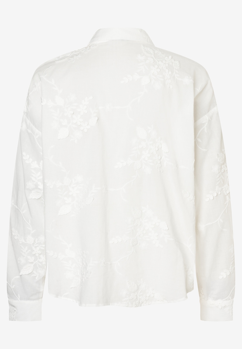 Die weiße MORE & MORE Bluse hat ein florales Muster. Die weiße MORE & MORE Bluse hat ein florales Muster.
