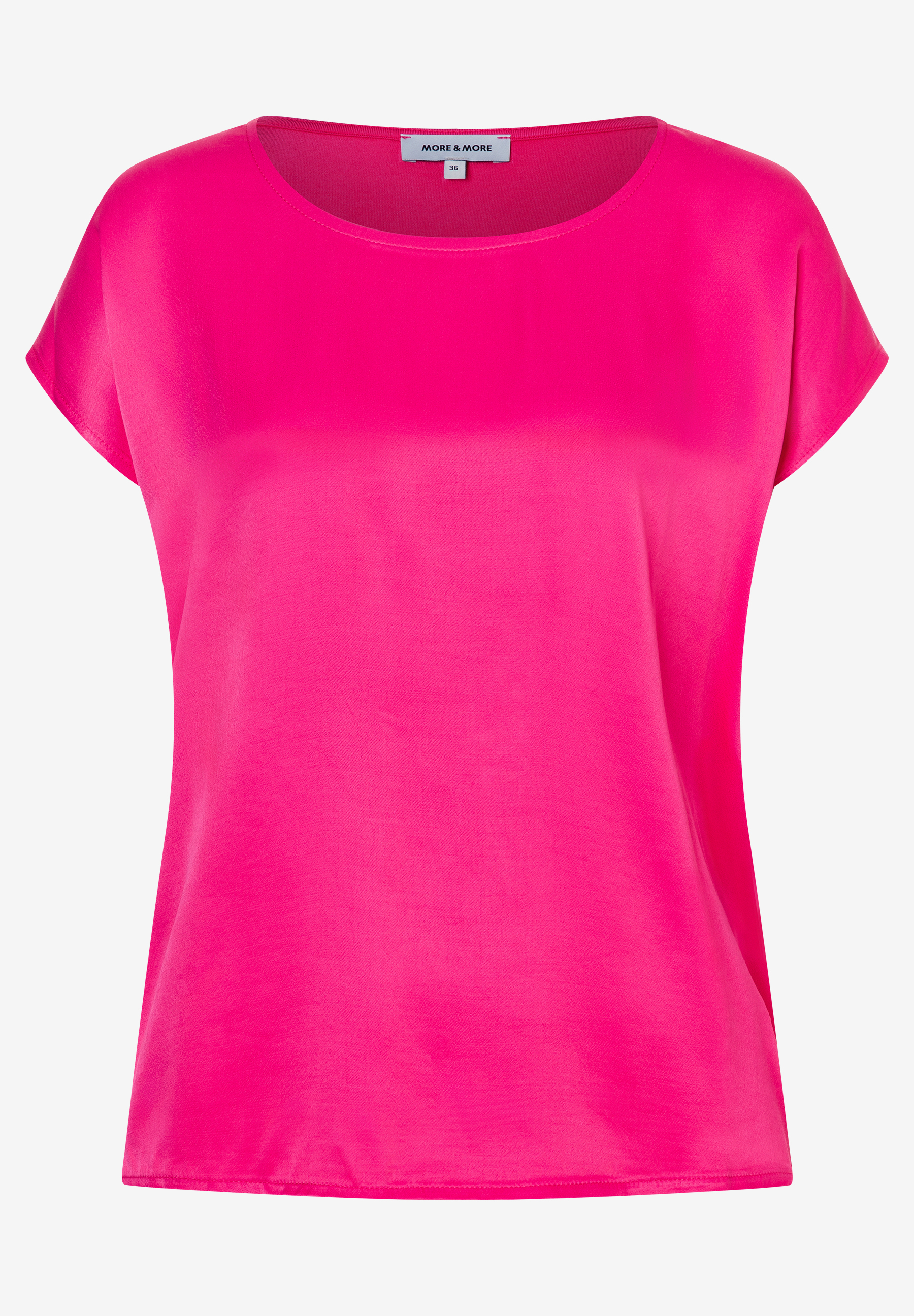 Ein pinkfarbenes MORE & MORE T-Shirt mit kurzen Ärmeln vor einem weißen Hintergrund. Ein pinkfarbenes MORE & MORE T-Shirt mit kurzen Ärmeln vor einem weißen Hintergrund.
