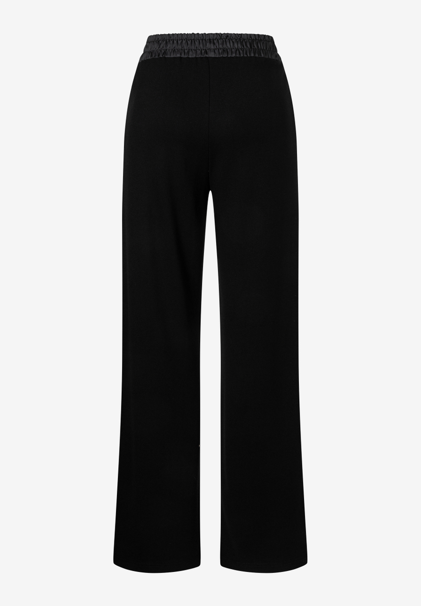 MORE & MORE schwarze Jersey-Hose, fließend und elastisch mit bequemem Gummibund. Perfekt für einen entspannten Stil. MORE & MORE schwarze Jersey-Hose, fließend und elastisch mit bequemem Gummibund. Perfekt für einen entspannten Stil.