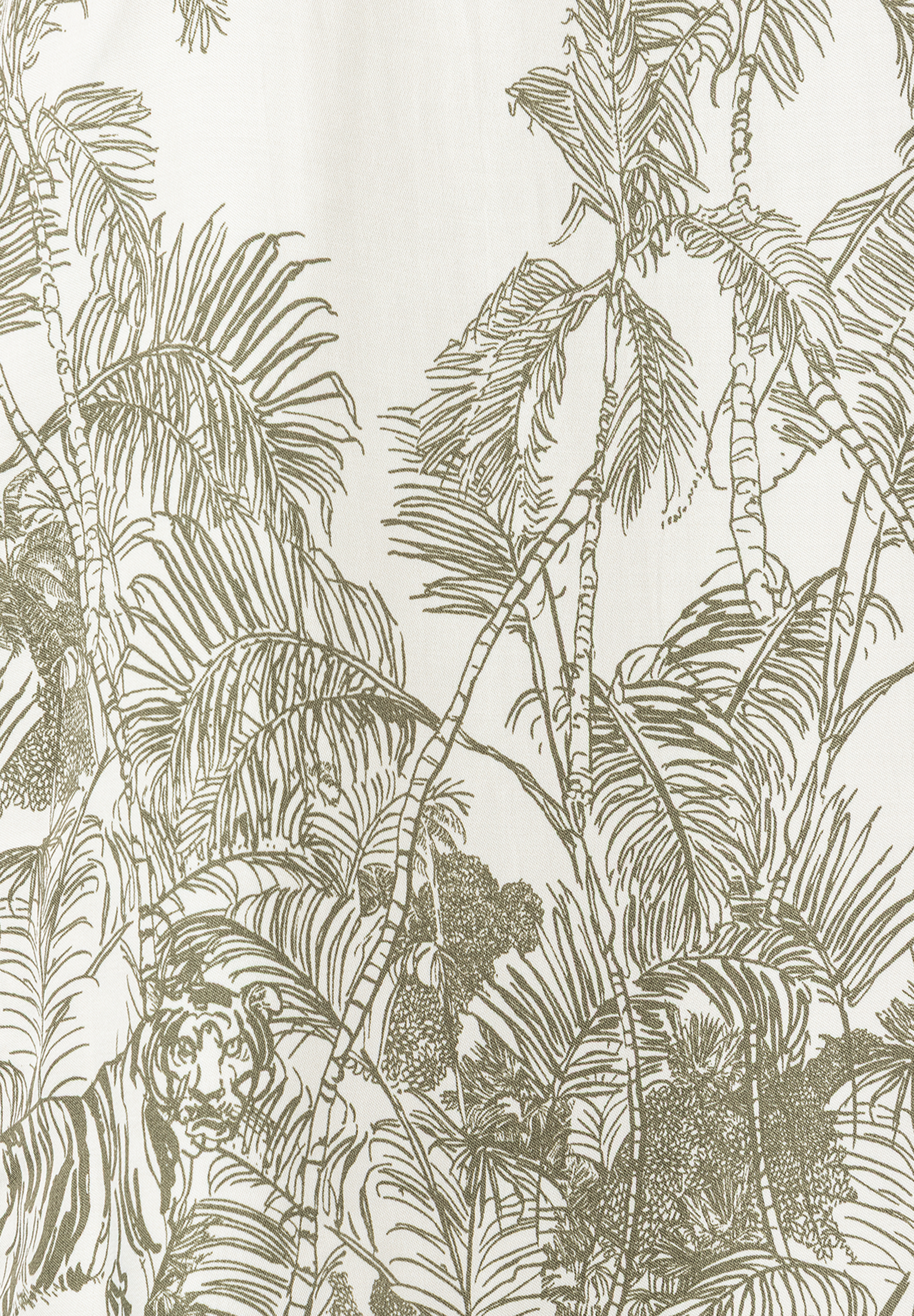 Ein Muster der MORE & MORE Bluse mit Palmen und einem Tiger. Ein Muster der MORE & MORE Bluse mit Palmen und einem Tiger.