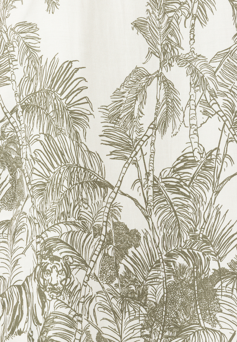 Ein Muster der MORE & MORE Bluse mit Palmen und einem Tiger. Ein Muster der MORE & MORE Bluse mit Palmen und einem Tiger.