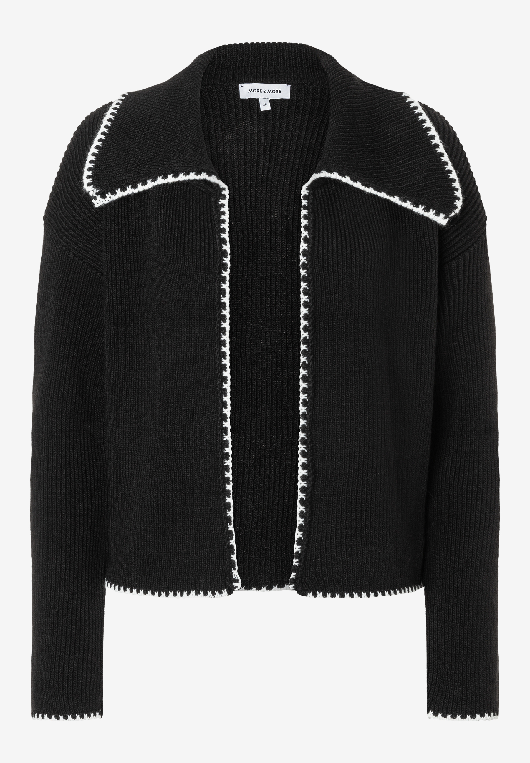 Ein schwarzer Strick-Cardigan von MORE & MORE mit weißem Saum. Ein schwarzer Strick-Cardigan von MORE & MORE mit weißem Saum.
