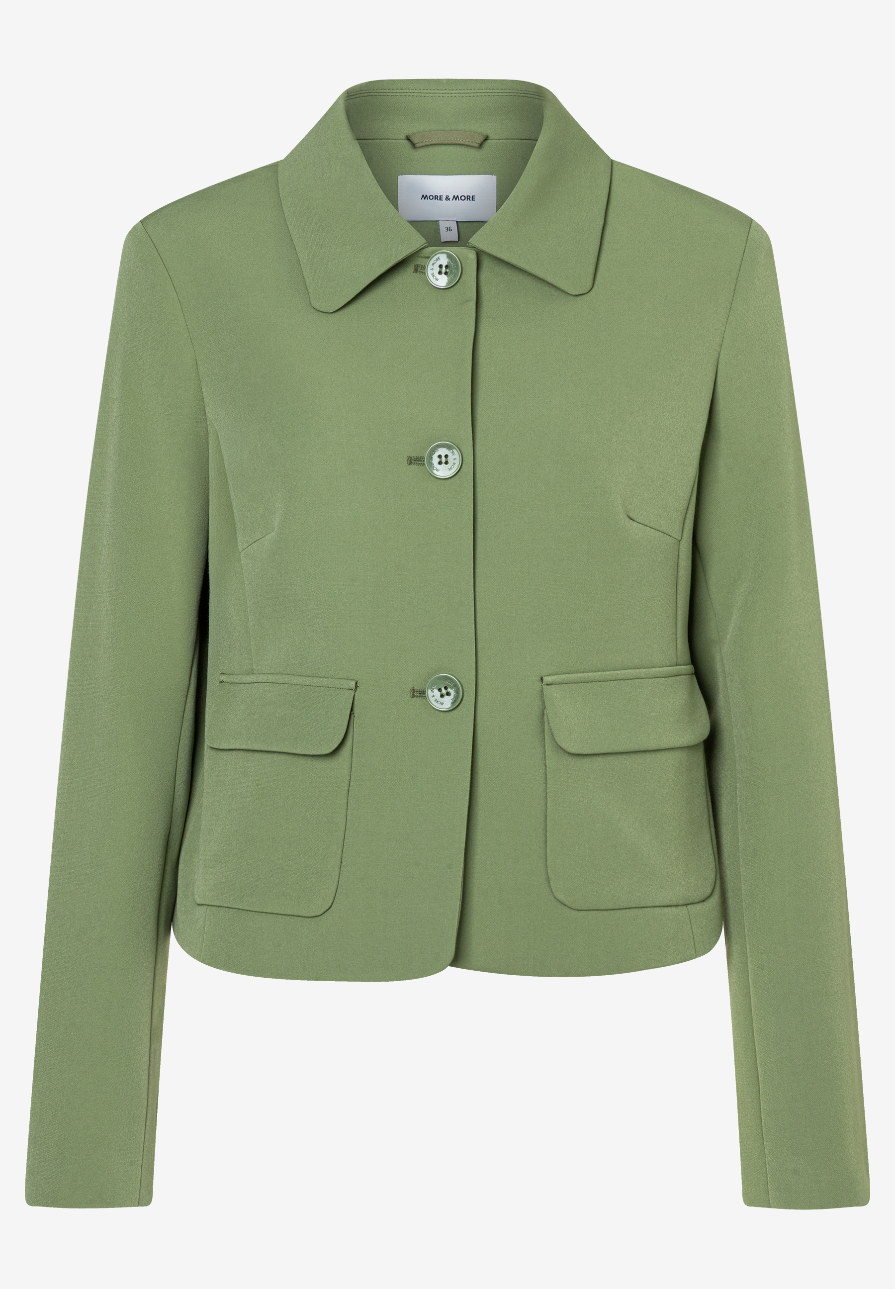 Ein olivgrüner Blazer von MORE & MORE mit drei Knöpfen und zwei aufgesetzten Taschen. Ein olivgrüner Blazer von MORE & MORE mit drei Knöpfen und zwei aufgesetzten Taschen.