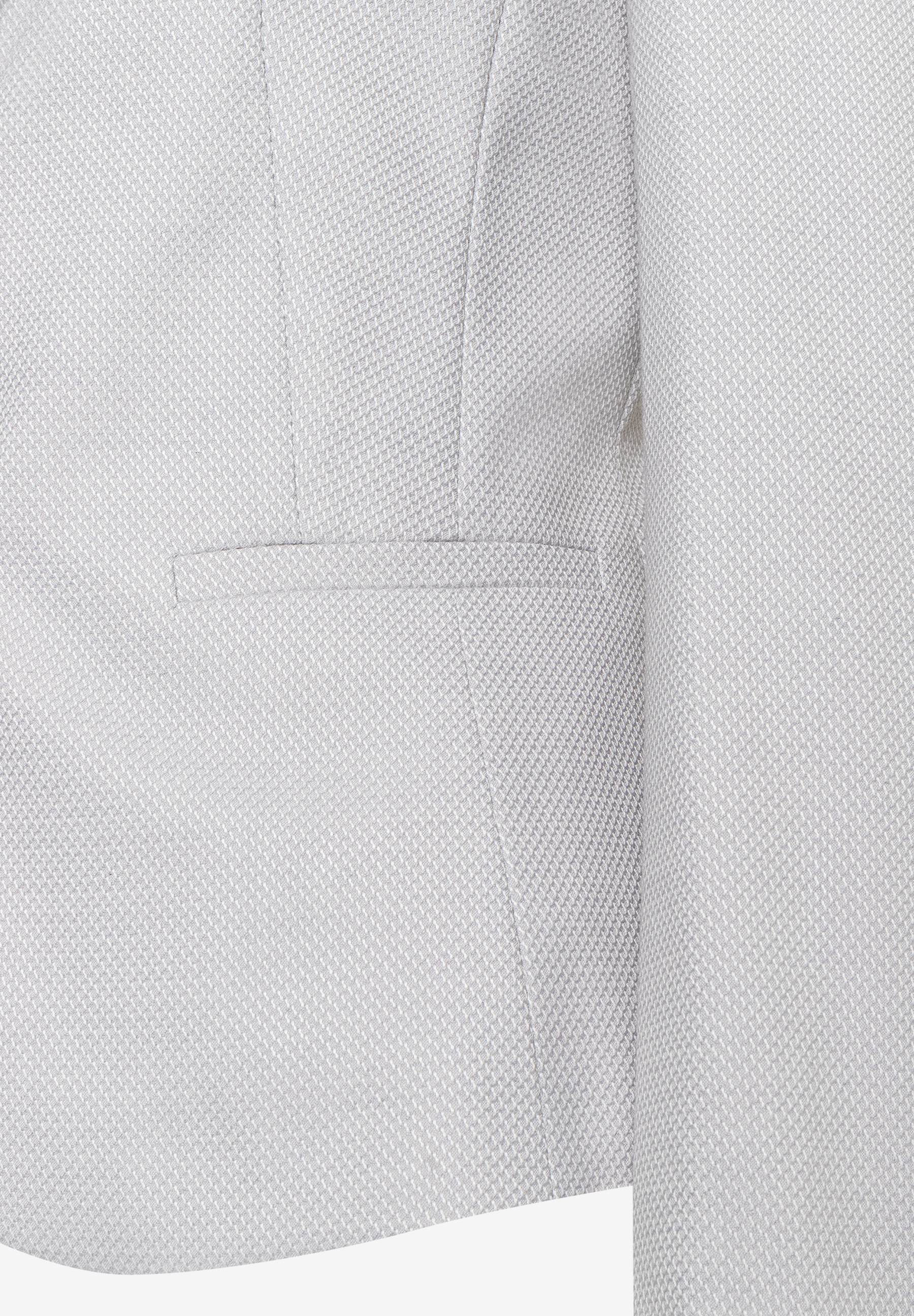 Detailansicht eines MORE & MORE Blazers mit Piqué- und Stretch-Materialkonstruktion. Detailansicht eines MORE & MORE Blazers mit Piqué- und Stretch-Materialkonstruktion.